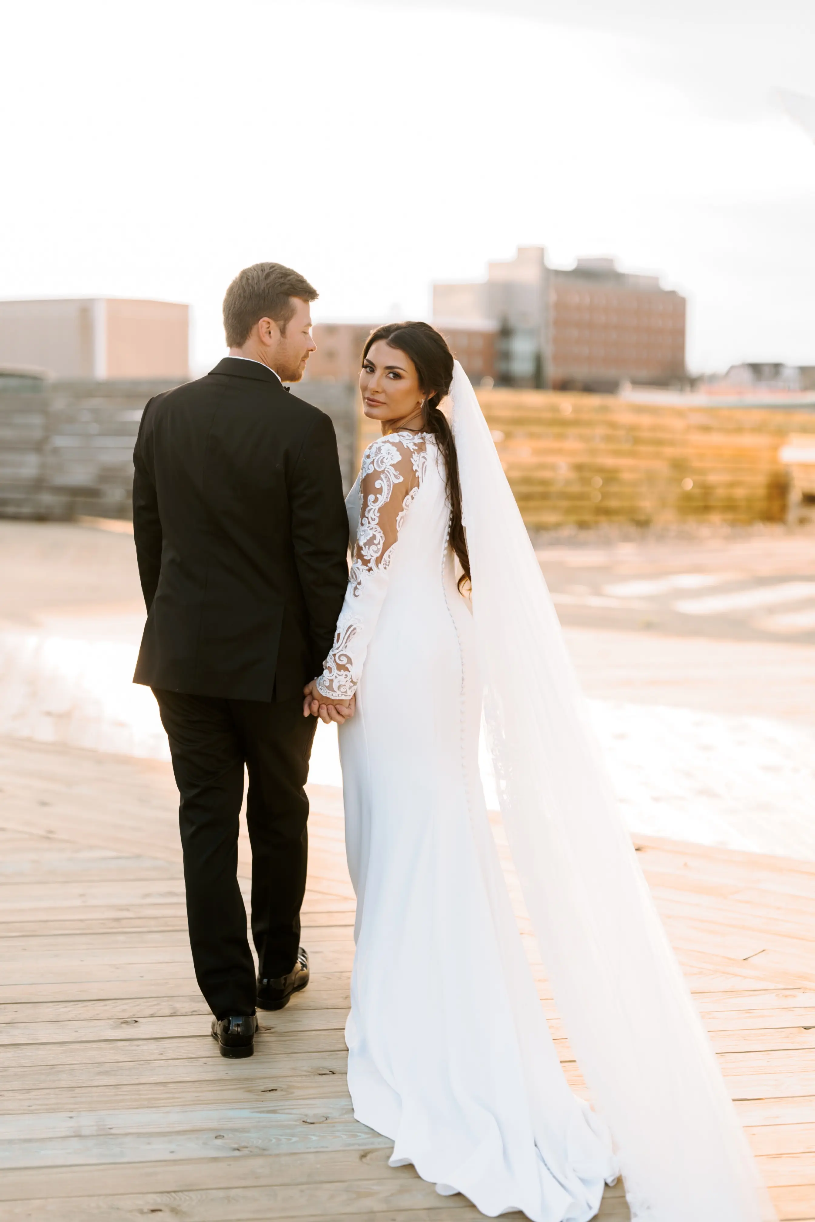 Bride in Modest Wedding Dress Called Bethany By Rebecca Ingram With Groom