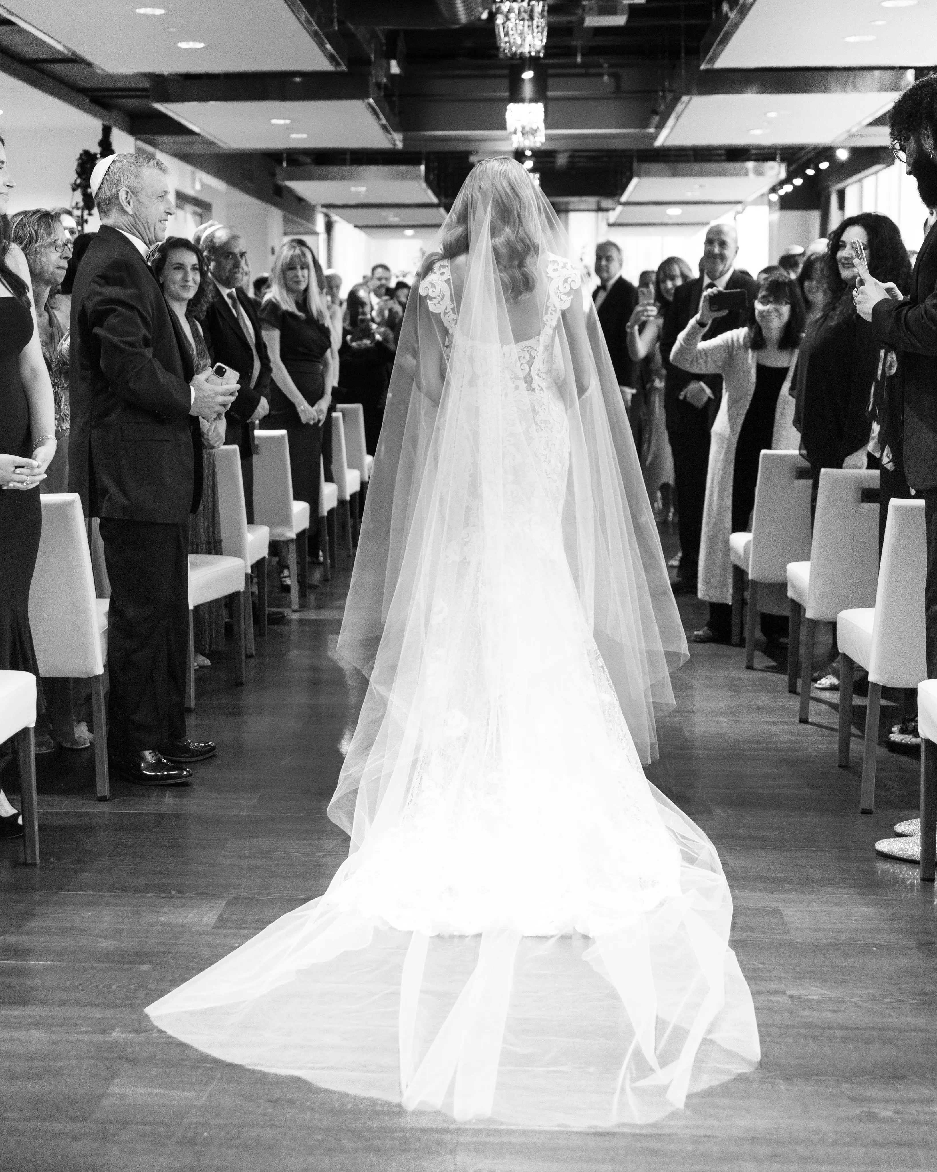 Bride Wearing A Lace Sheath Wedding Gown Named Tuscany Lynette By Maggie Sottero Bride Walking Down Aisle