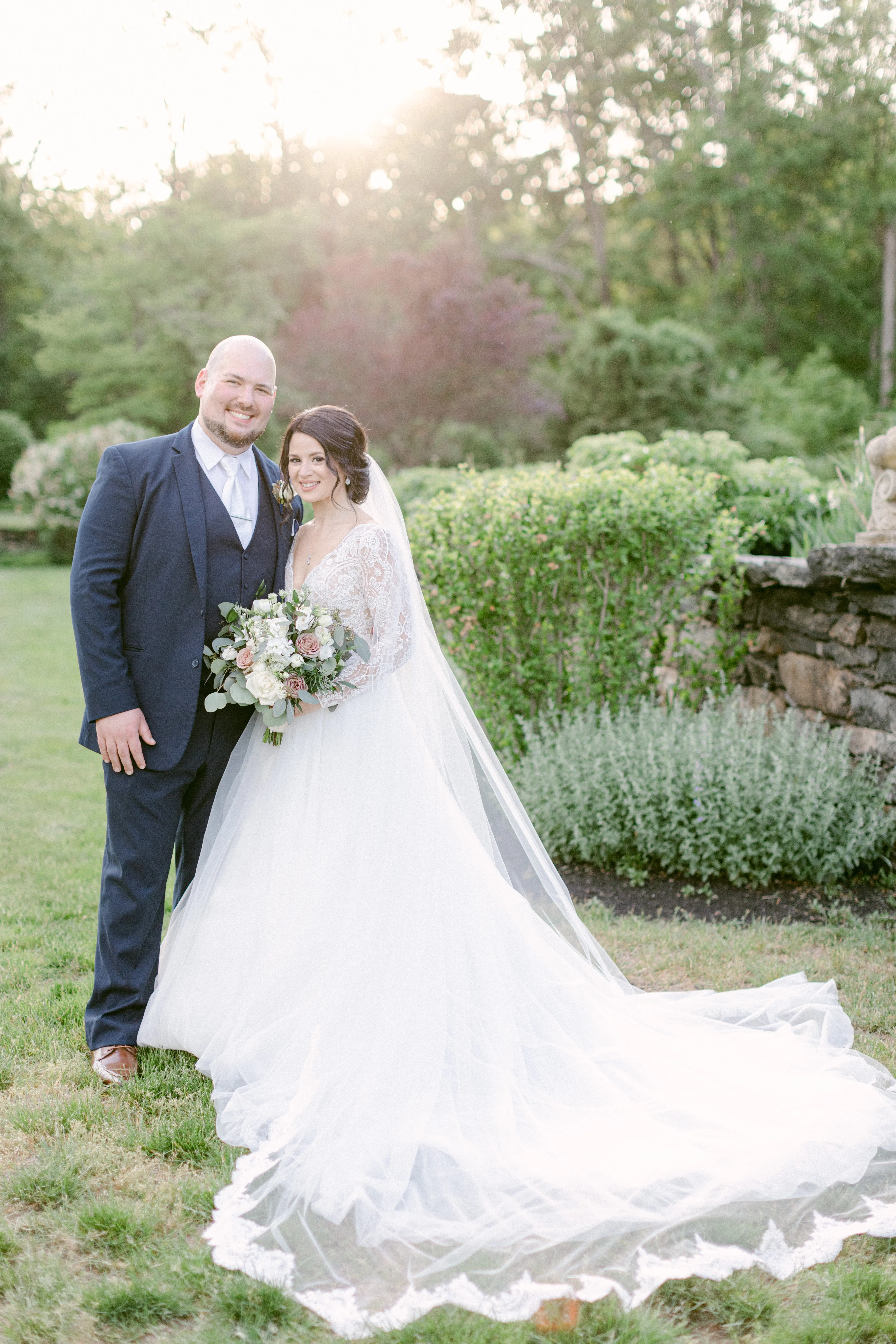 Groom With Bride Wearing Ballgown With Long Sleeves Called Mallroy Dawn By Maggie Sottero