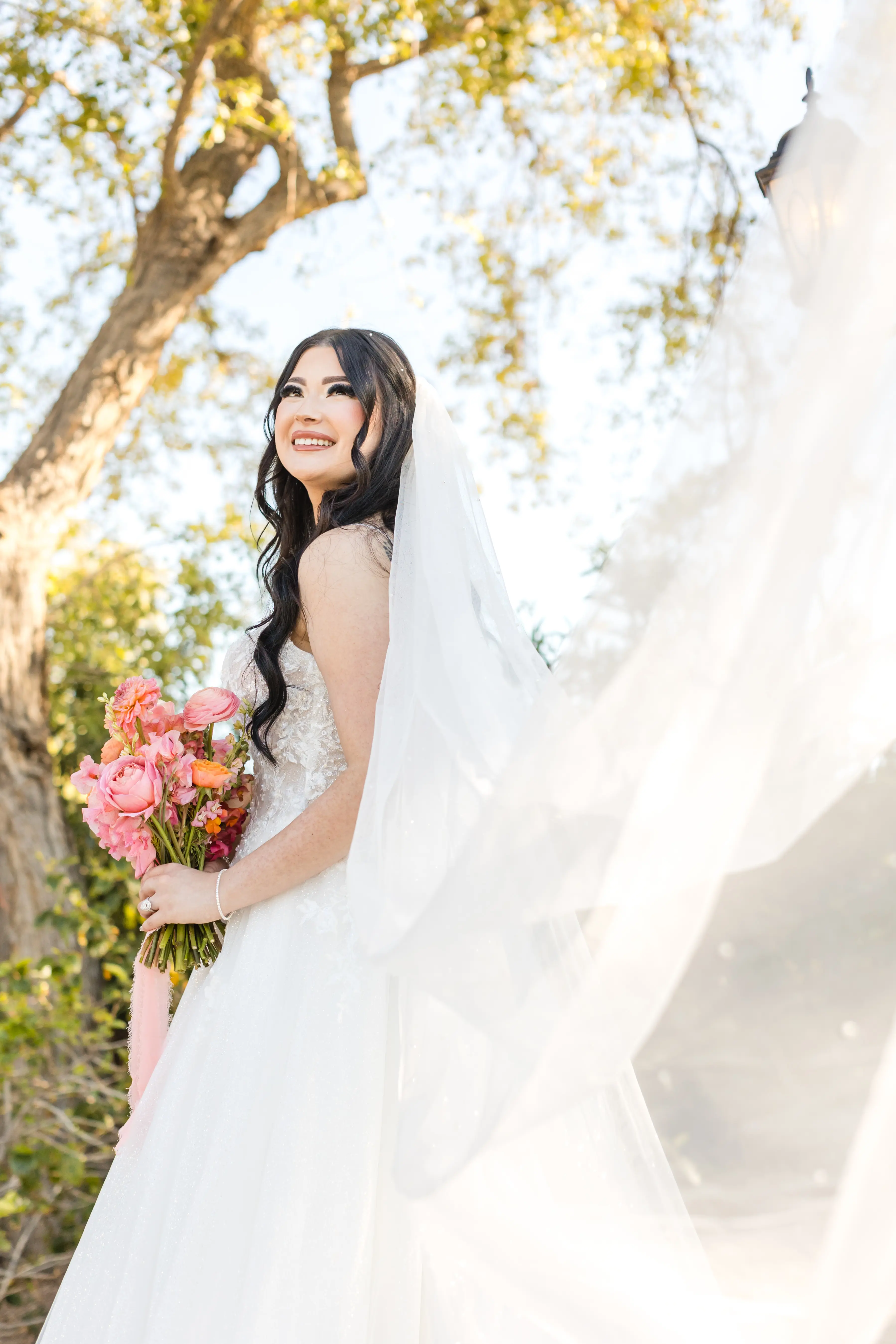 Bride wearing Casey by Maggie Sottero with a veil