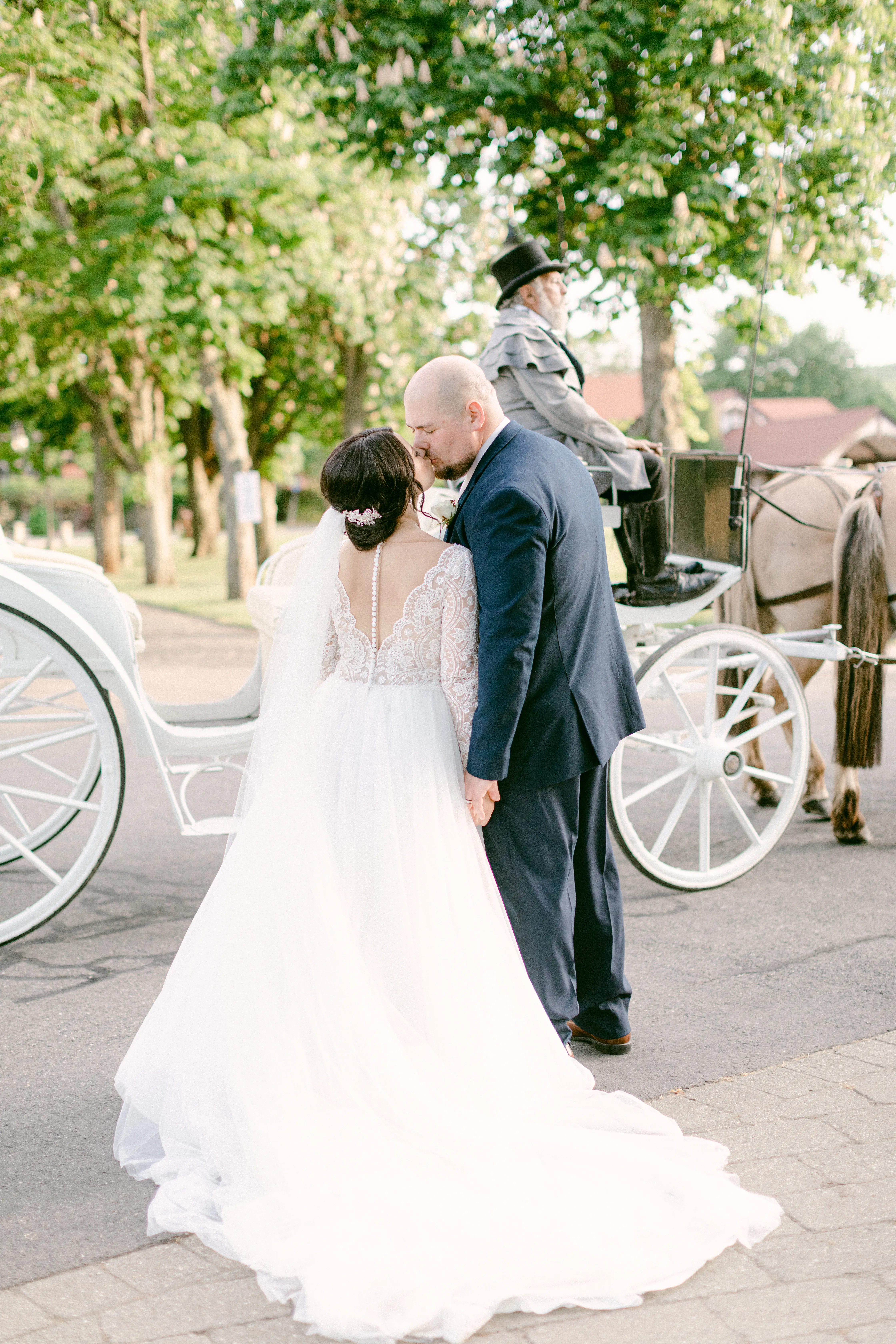 Groom With Bride Wearing Ballgown With Long Sleeves Called Mallroy Dawn By Maggie Sottero