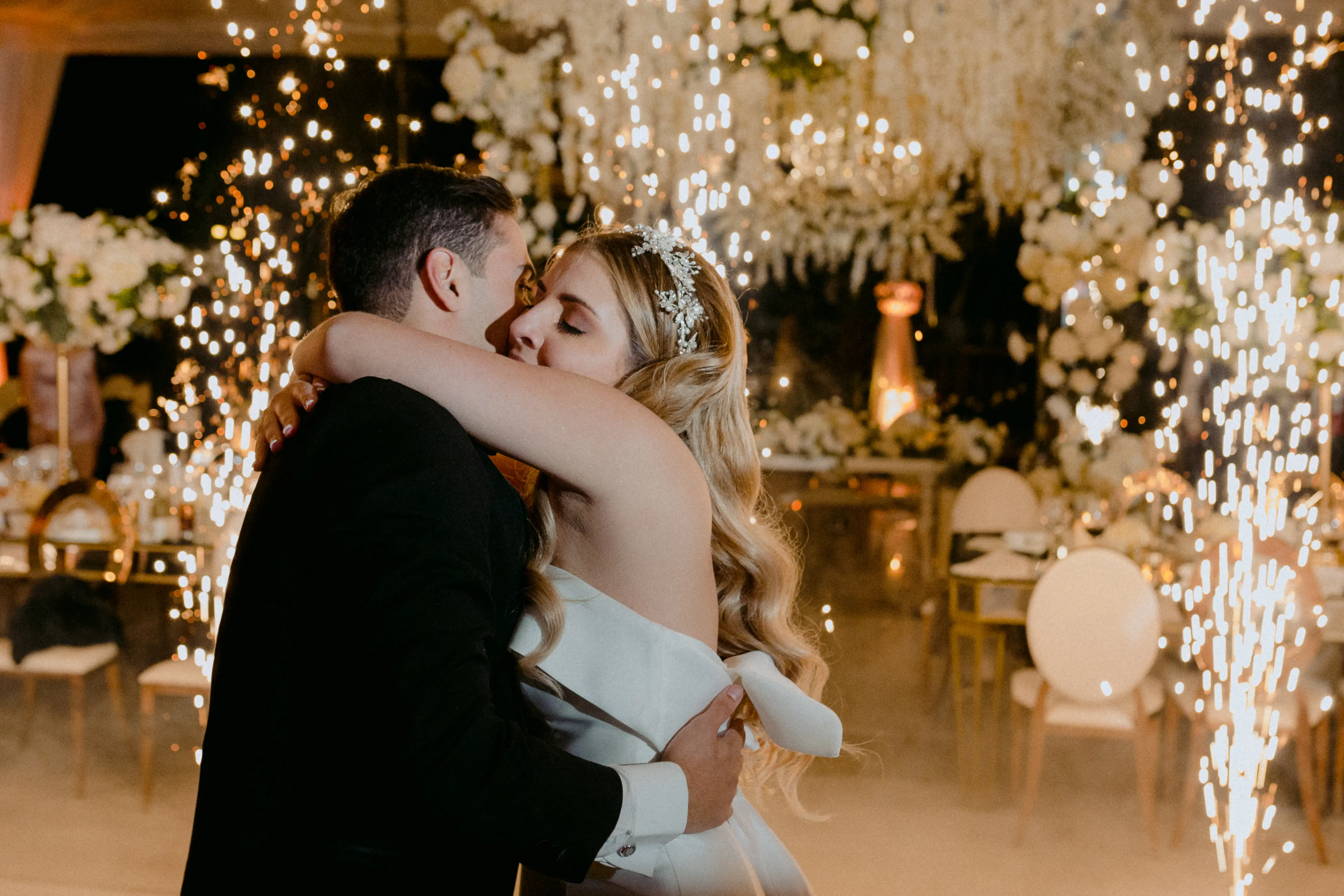 Bride Hugging Groom Wearing Wedding Dress Called Mitchell by Maggie Sottero