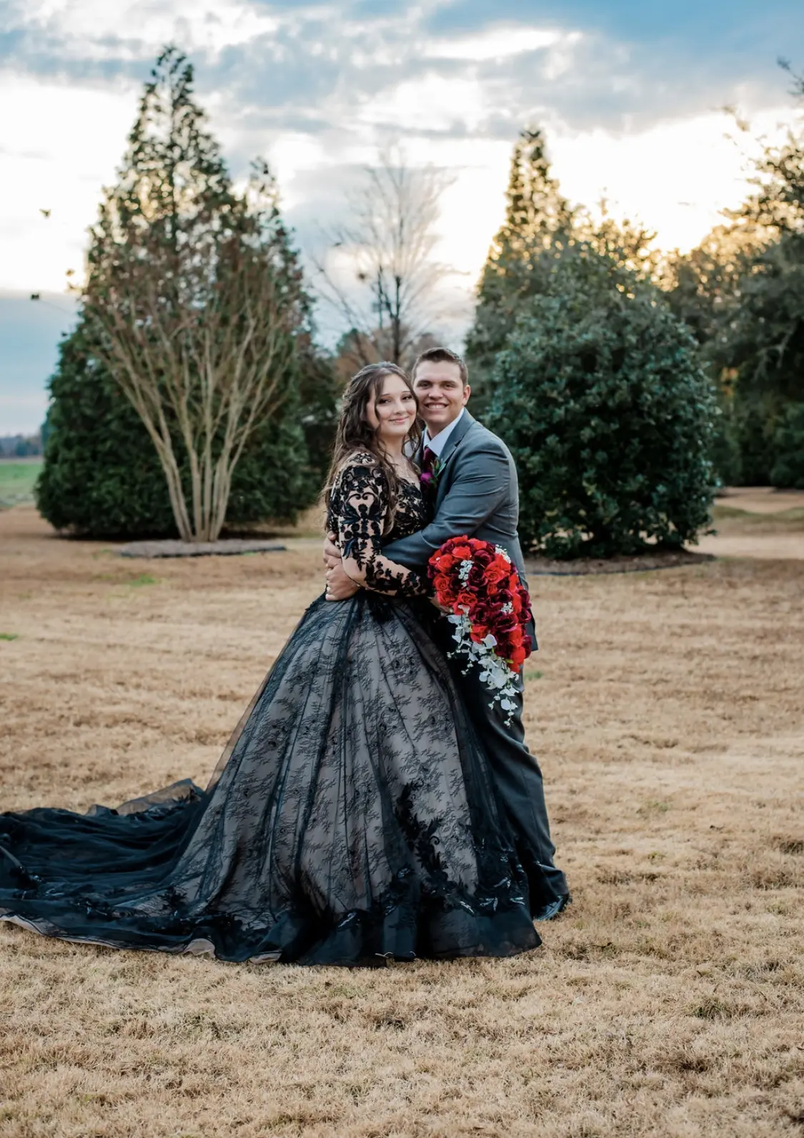 Bride Wearing Black Lace Ballgown Wedding Dress Called Zander By Sottero and Midgley With Groom