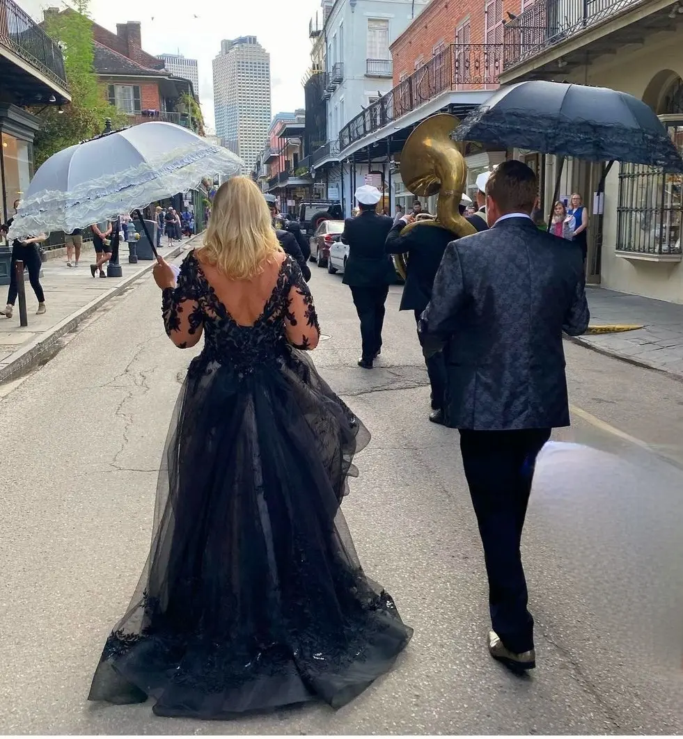 Groom With Bride Wearing Black Lace Ball Gown Zander By Sottero And Midgley