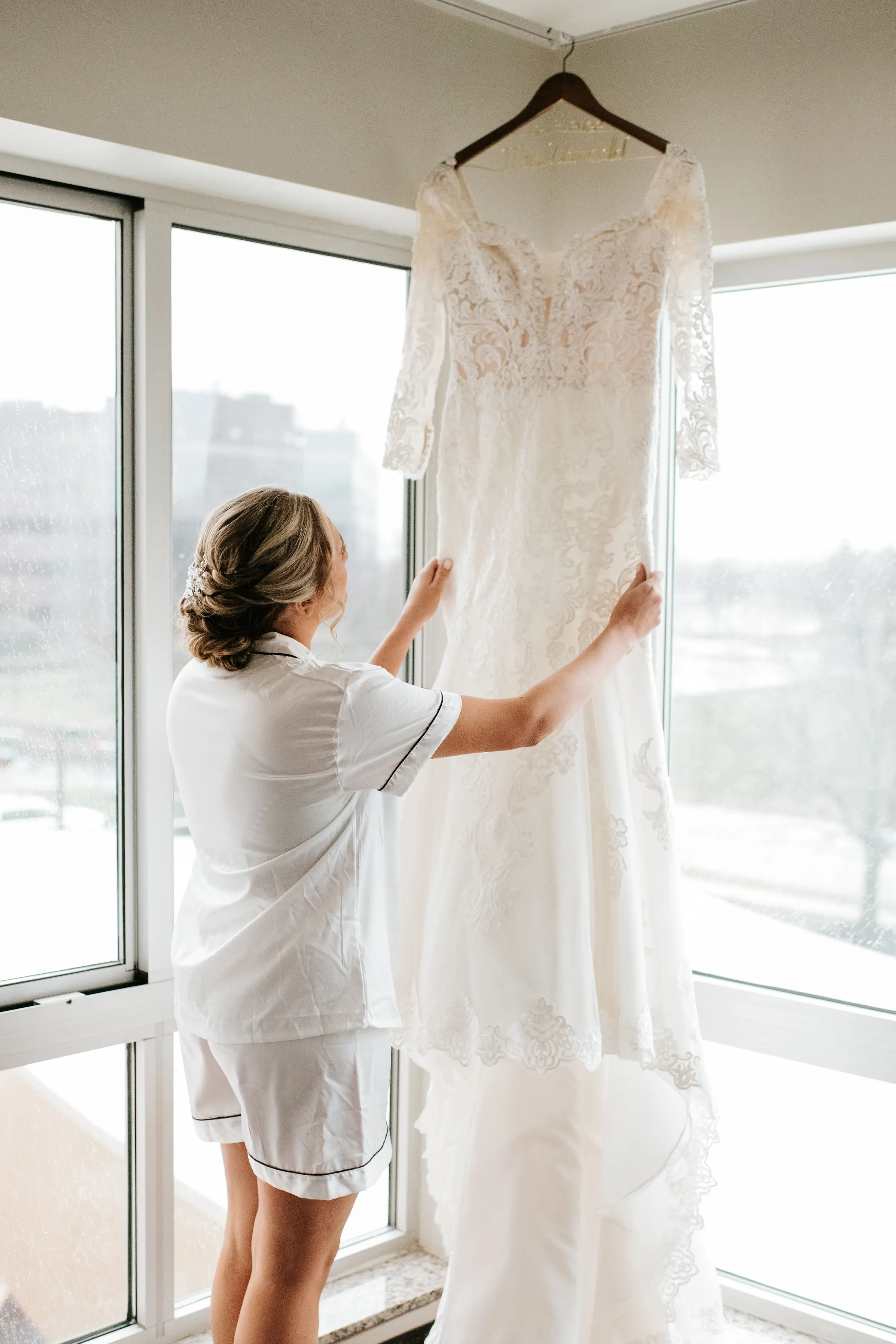 Bride Excited to Put on Her Sparkly Lace Fit-and-Flare Bridal Dress with Off-the-Shoulder Sleeves Called Fiona by Maggie Sottero