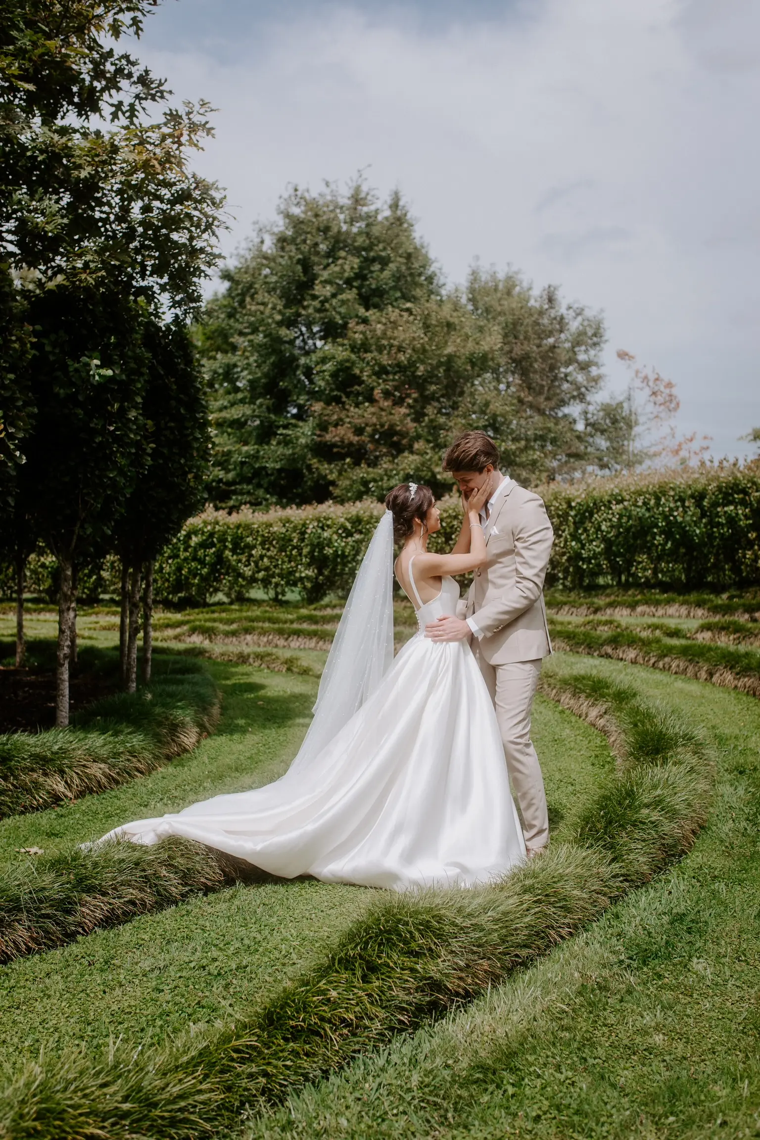 Bride In Satin A-Line Wedding Dress Called Selena By Maggie Sottero With Groom