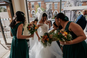 Bride wearing Harlem by Maggie Sottero with her bridesmaids