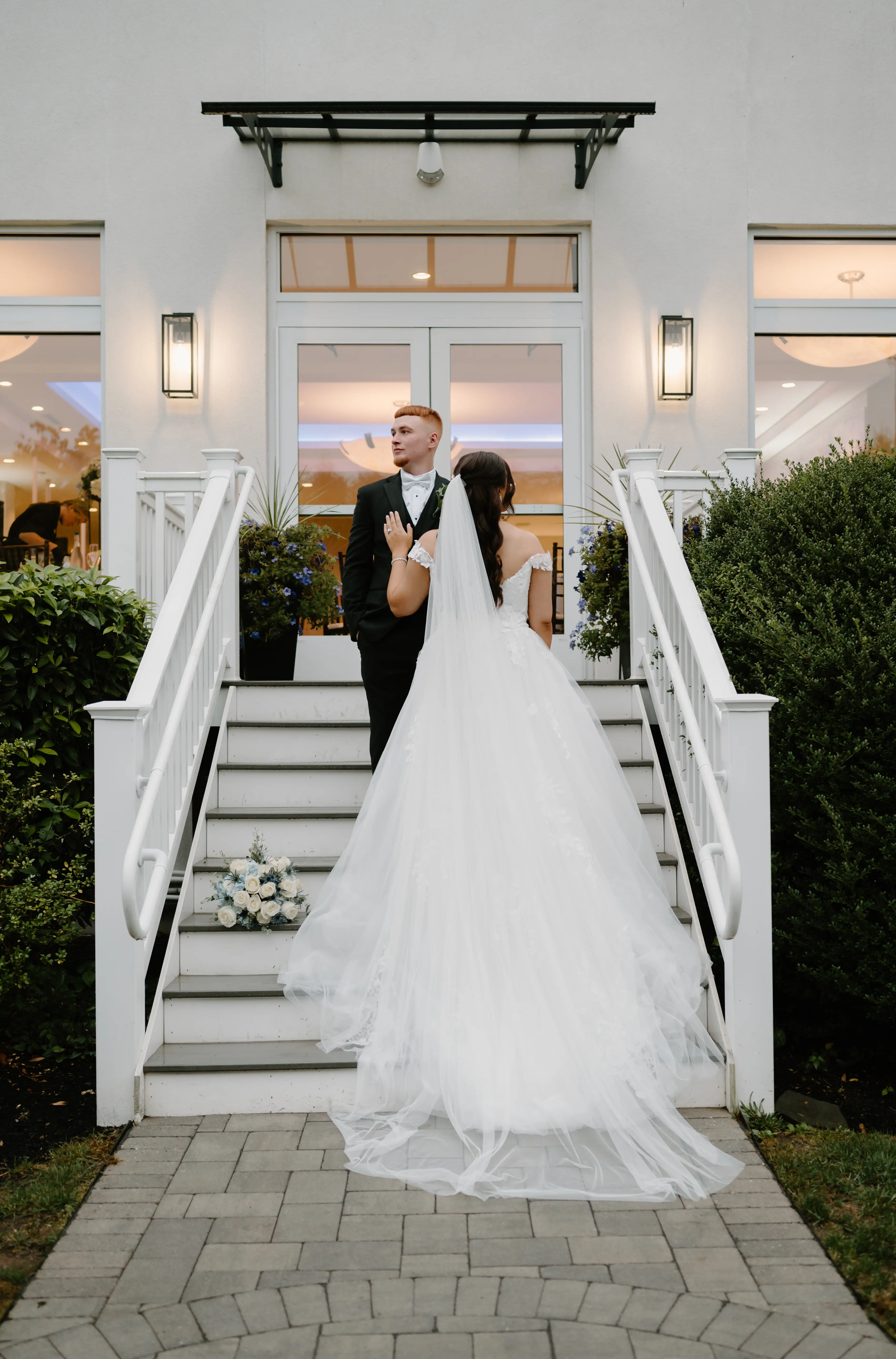 Bride Wearing Lace Princess Dress Called Harlem By Maggie Sottero With Groom On Stairs