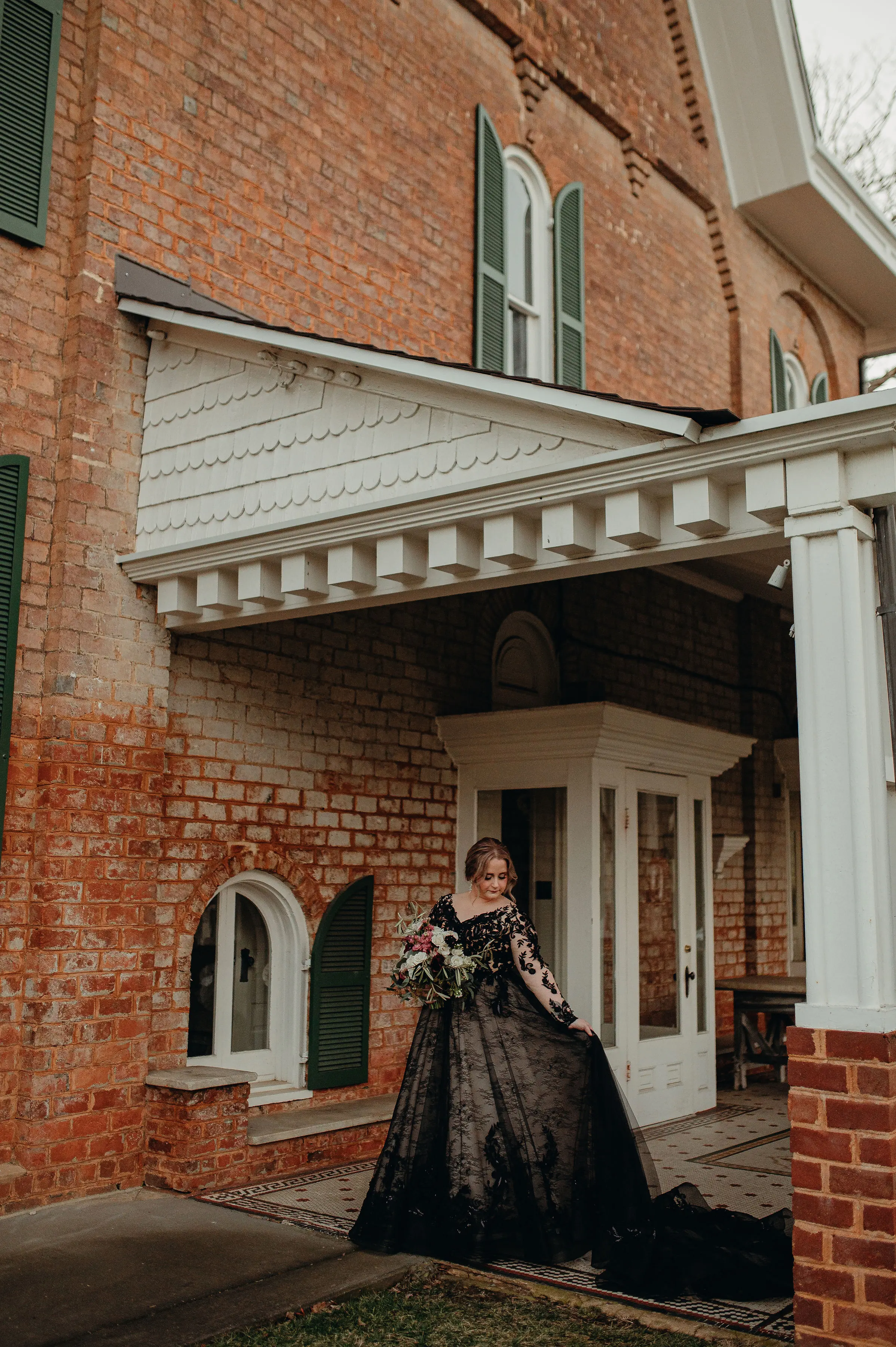 Bride In Long Sleeve Black Wedding Dress Called Zander By Sottero And Midgley