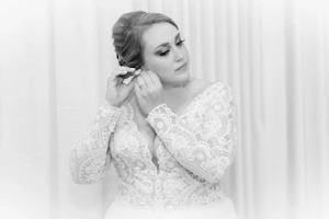 Bride in Romantic Ball Gown Wedding Dress with Illusion Plunging V-Neckline Called Mallory Dawn by Maggie Sottero