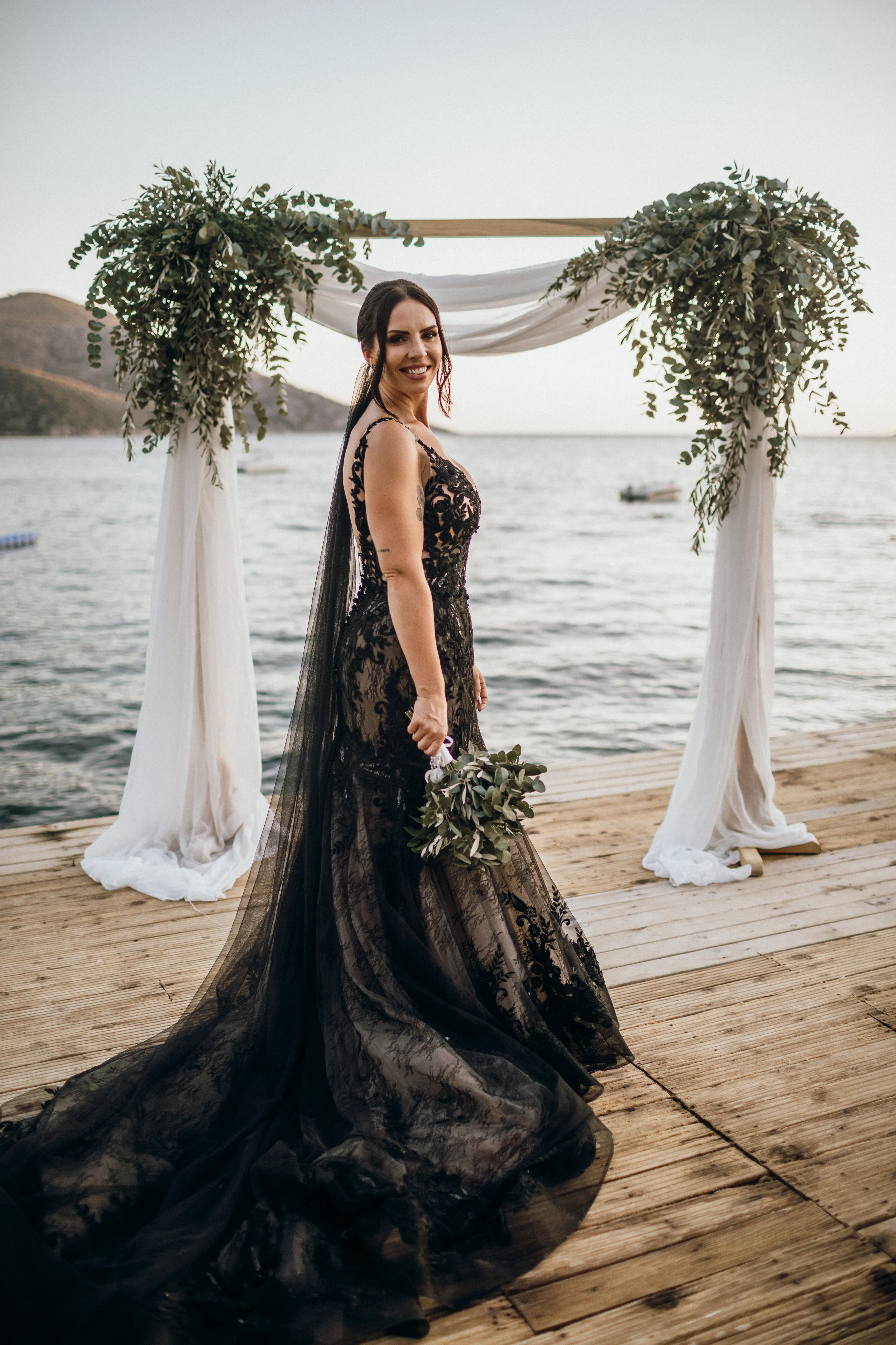 Bride Wearing Black Fit And Flare Wedding Dress Called Zander Lane By Sottero And Midgley At Her Destination Wedding