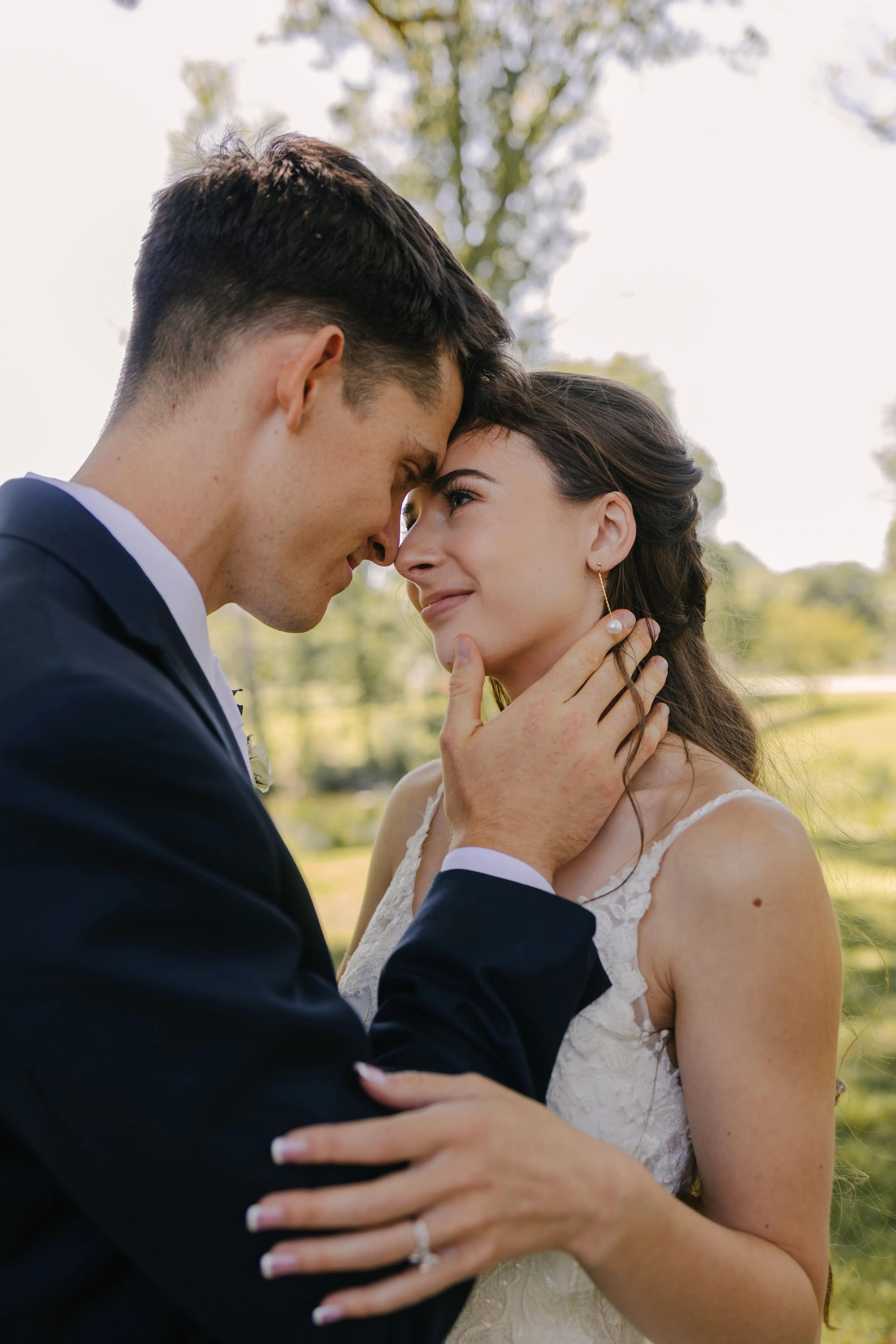 Bride wearing Charlotte by Rebecca Ingram looking into her husband's eyes