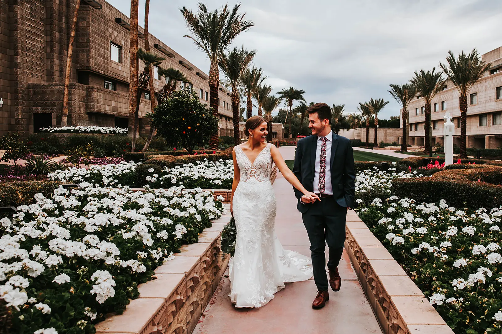Groom With Bride In Blossoming Wedding Dress Called Greenley By Maggie Sottero