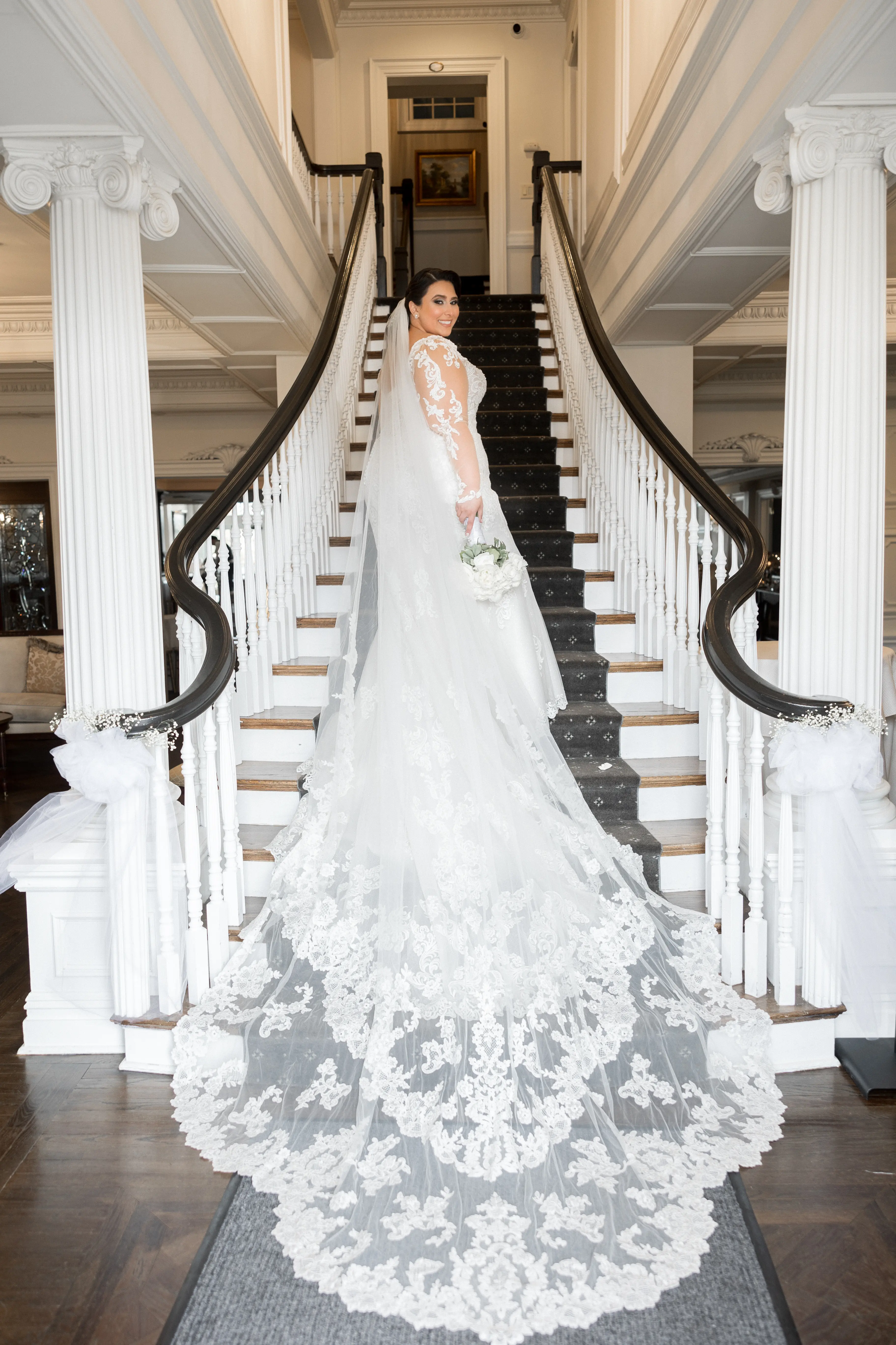 Bride Wearing Sexy Lace Long Sleeve Wedding Dress Called Fiona By Maggie Sottero With Cathedral Length Veil