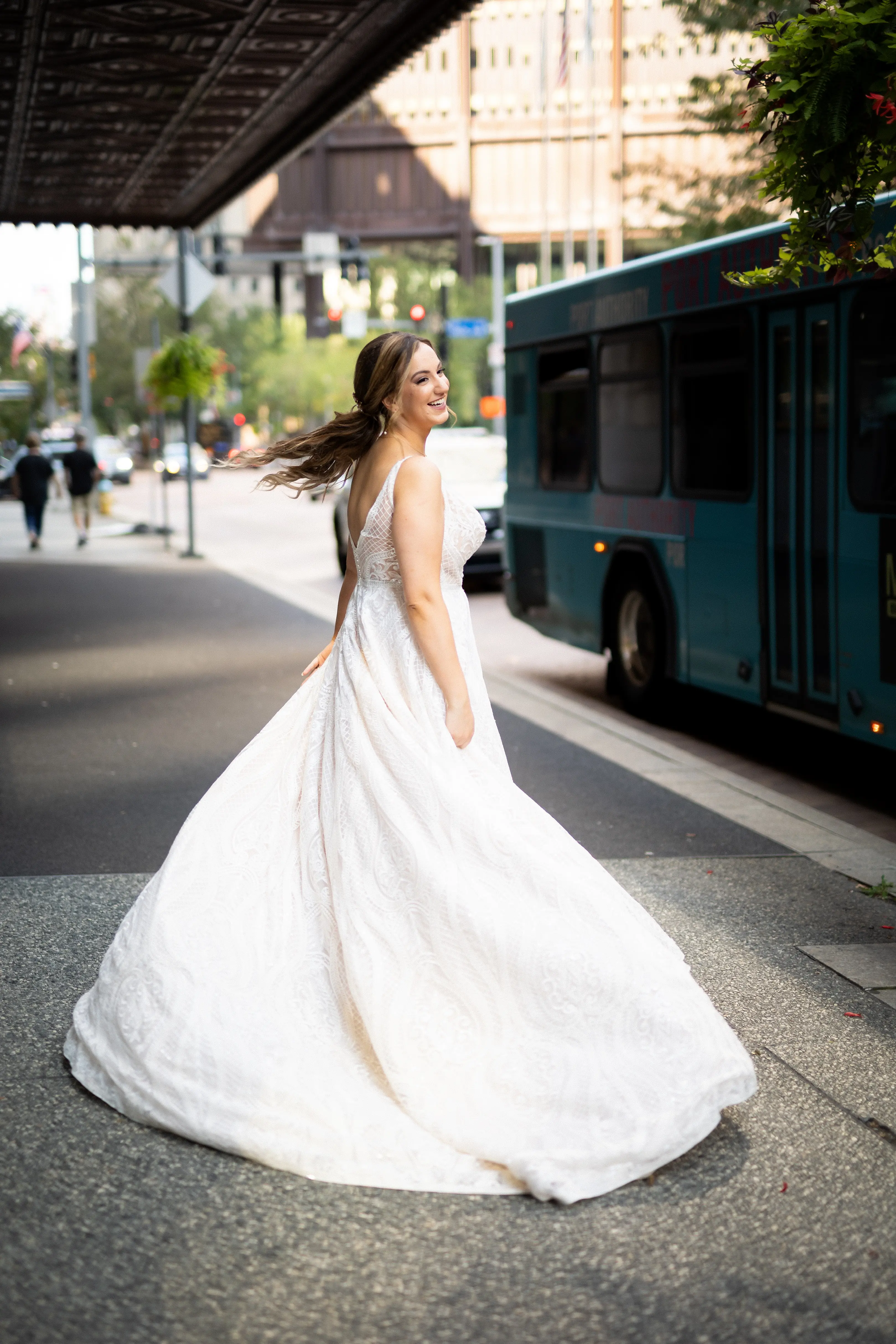 Bride Wearing Glam Princess A-Line Wedding Dress Called Roxanne By Sottero And Midgley