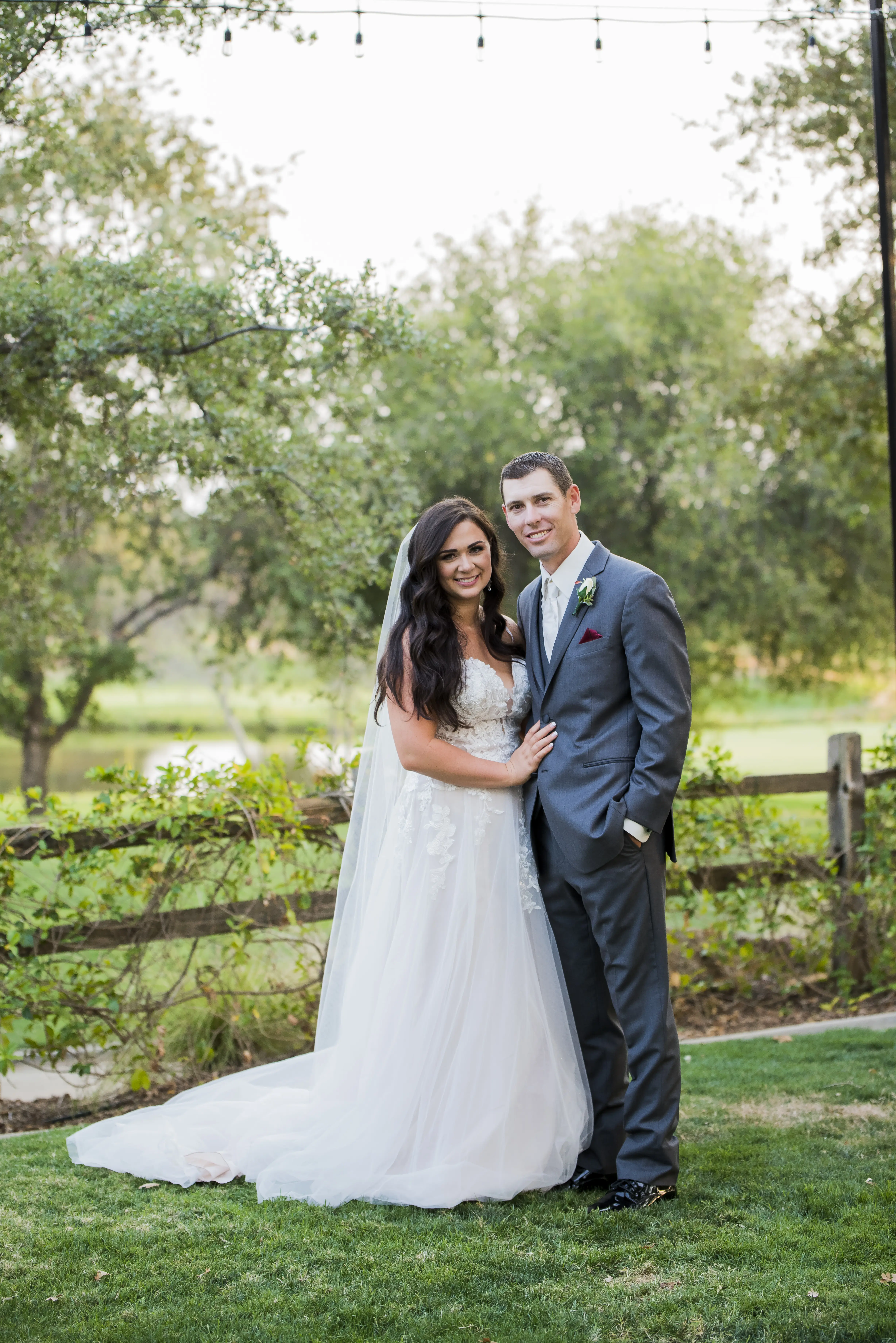 Bride wearing Princess Wedding Gown called Stevie by Maggie Sottero with her groom