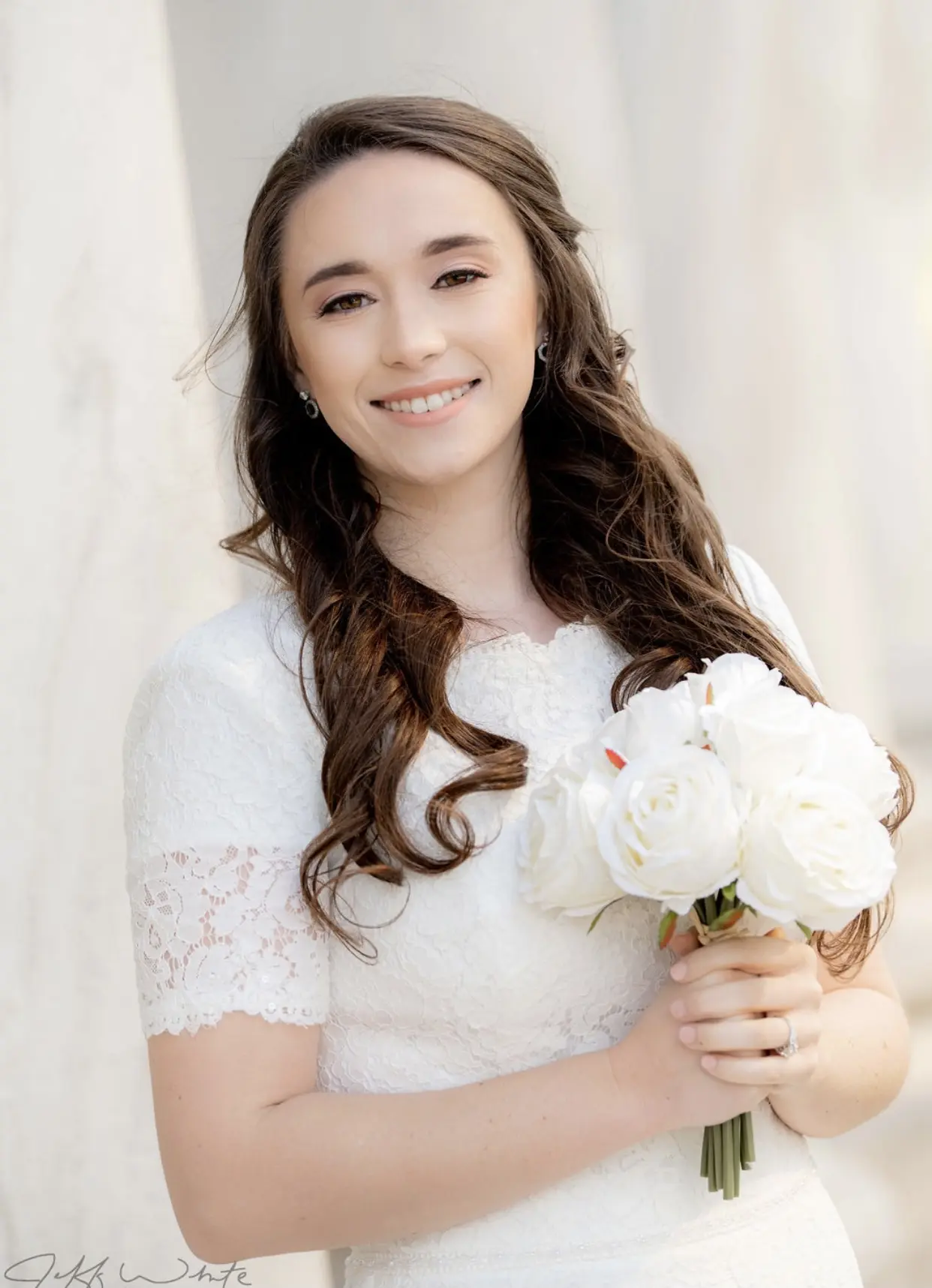 Real Bride wearing modest wedding dress called Prescott by Maggie Sottero.