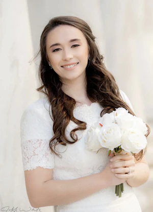 Real Bride wearing modest wedding dress called Prescott by Maggie Sottero.