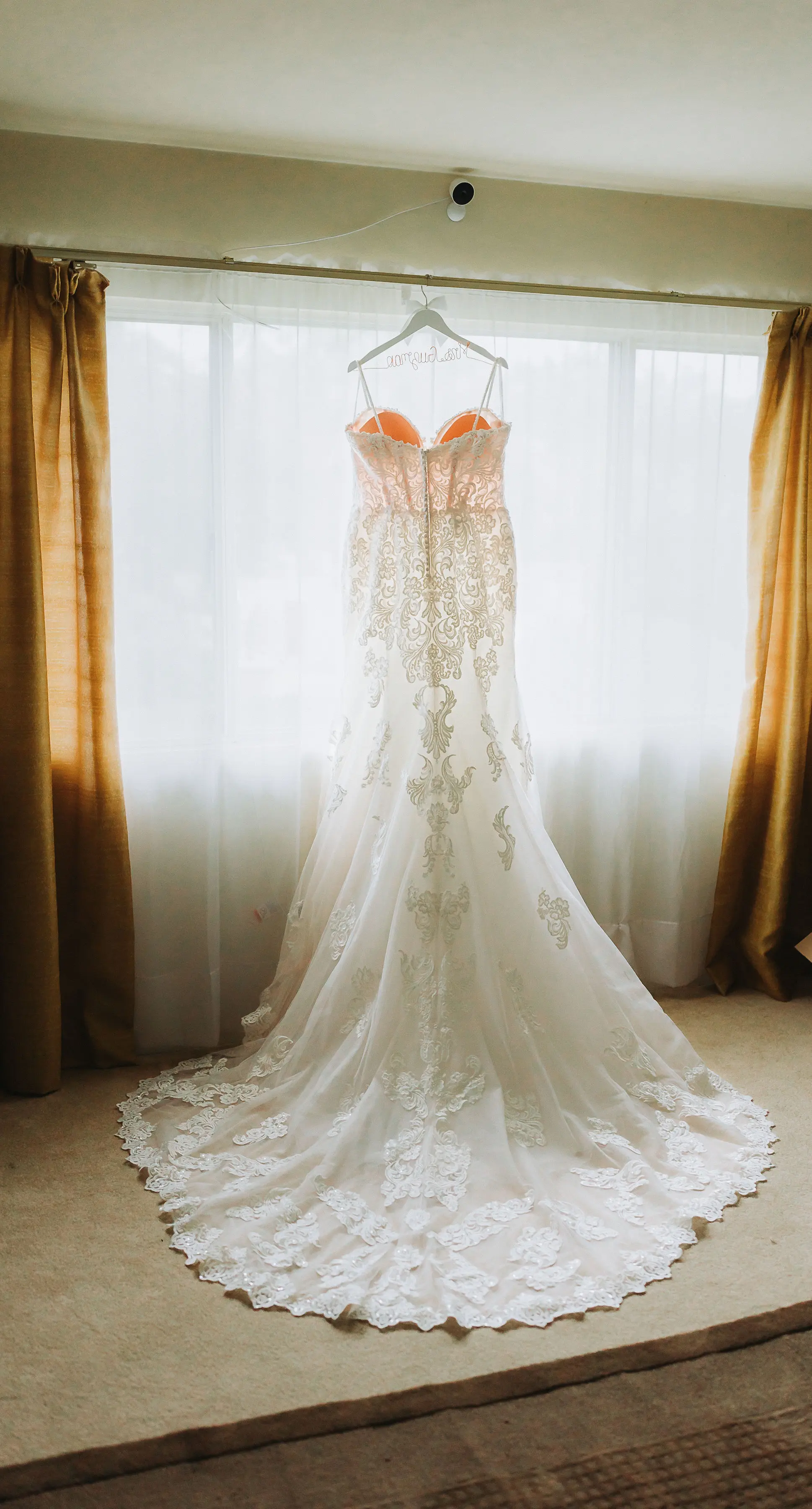 Fiona wedding dress by Maggie Sottero hanging up
