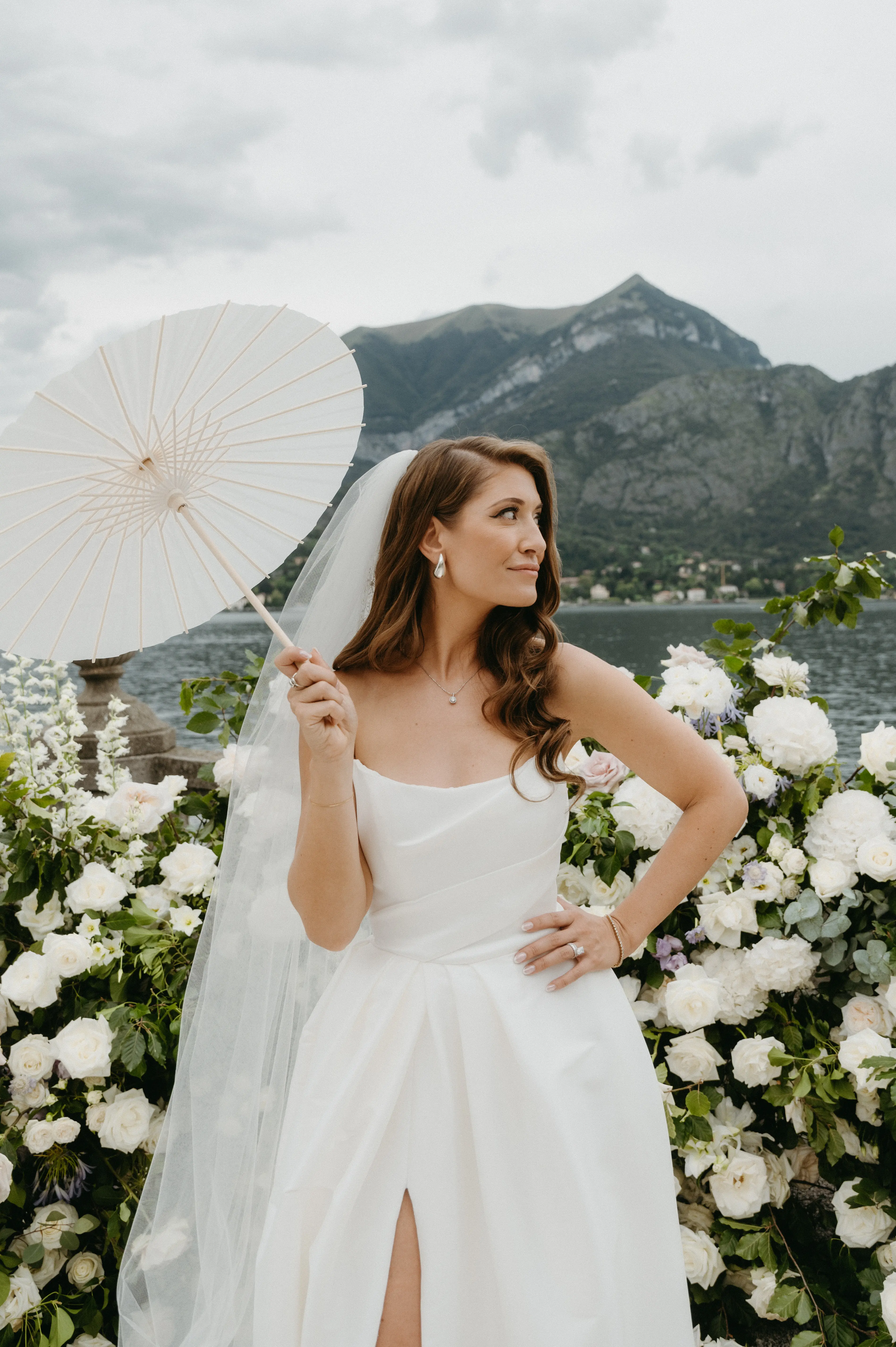 Bride wearing Aspen by Sottero and Midgley with a parasol