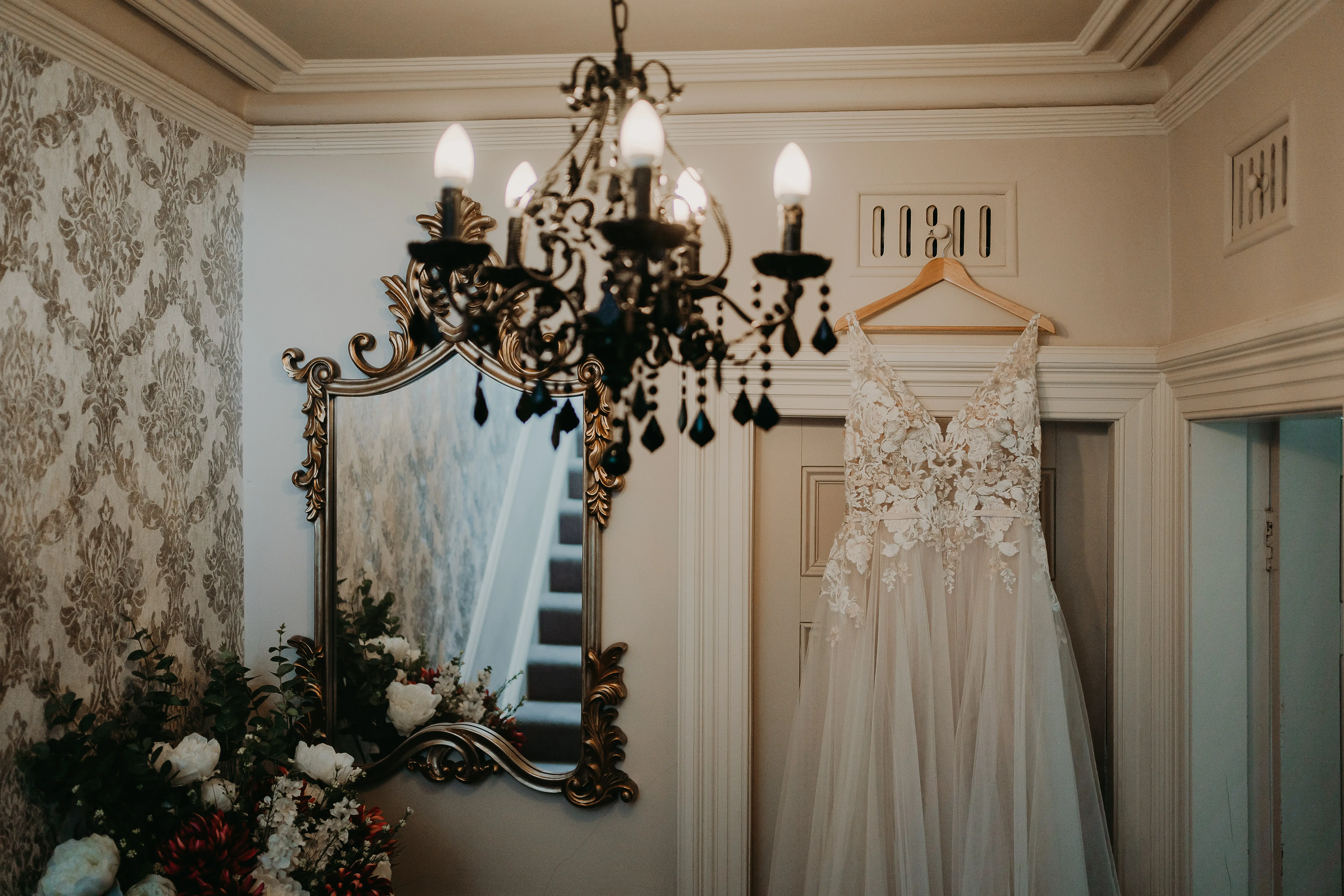 Wedding dress called Minerva hanging in doorway!