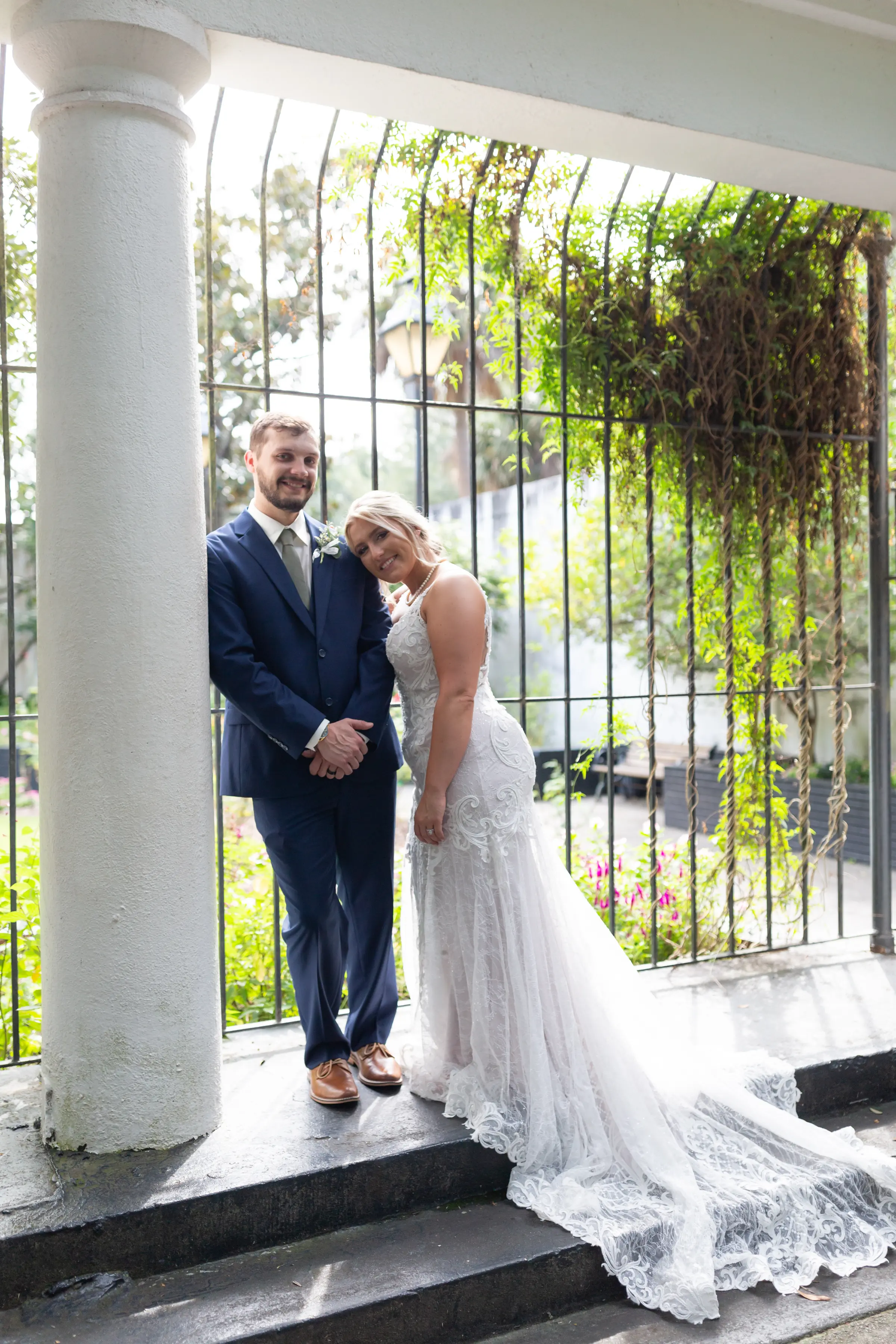 Bride leaning on groom's shoulder.