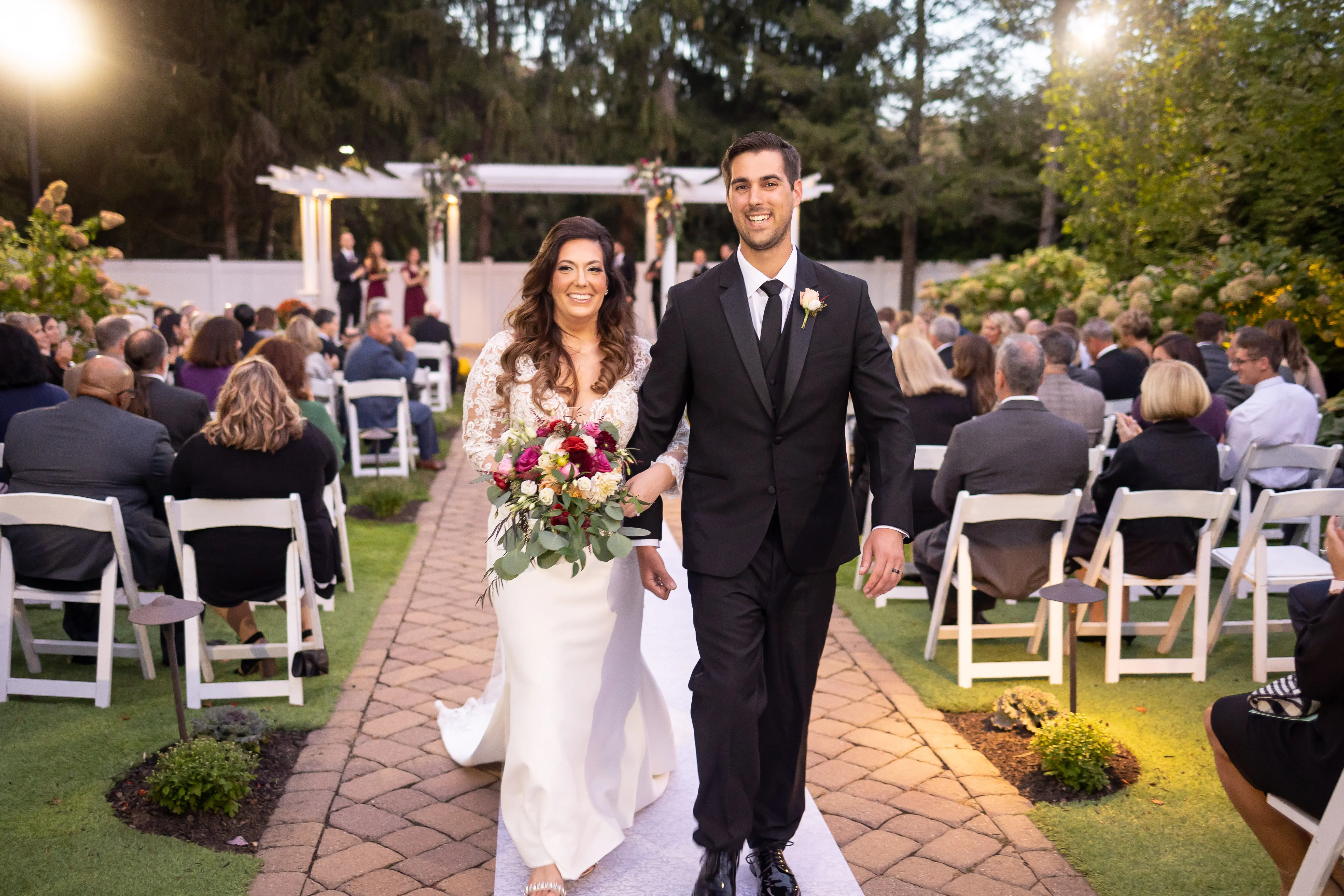 Groom With Bride Wearing Long Sleeve Sheath Wedding Dress Althea By Maggie Sottero