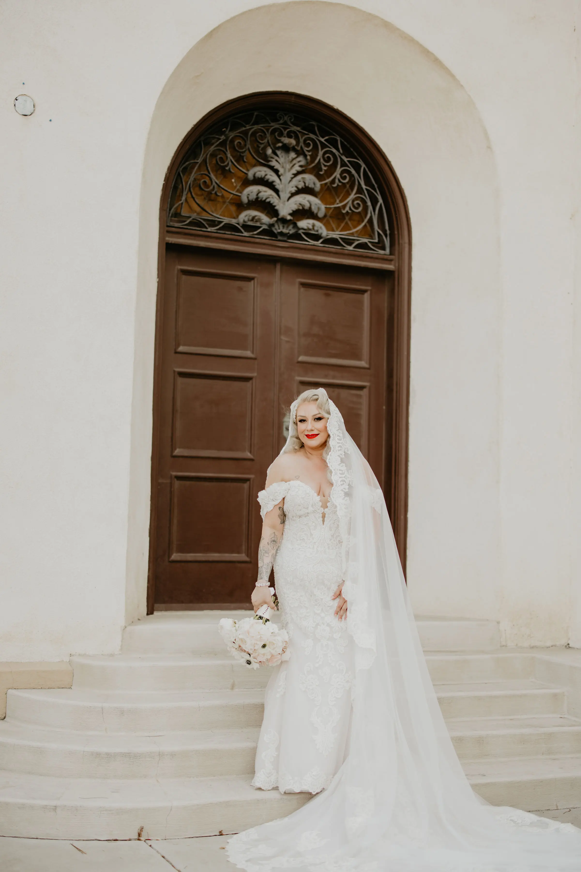 Bride Wearing Sexy Lace Wedding Dress Called Fiona By Maggie Sottero Standing Outside The Venue