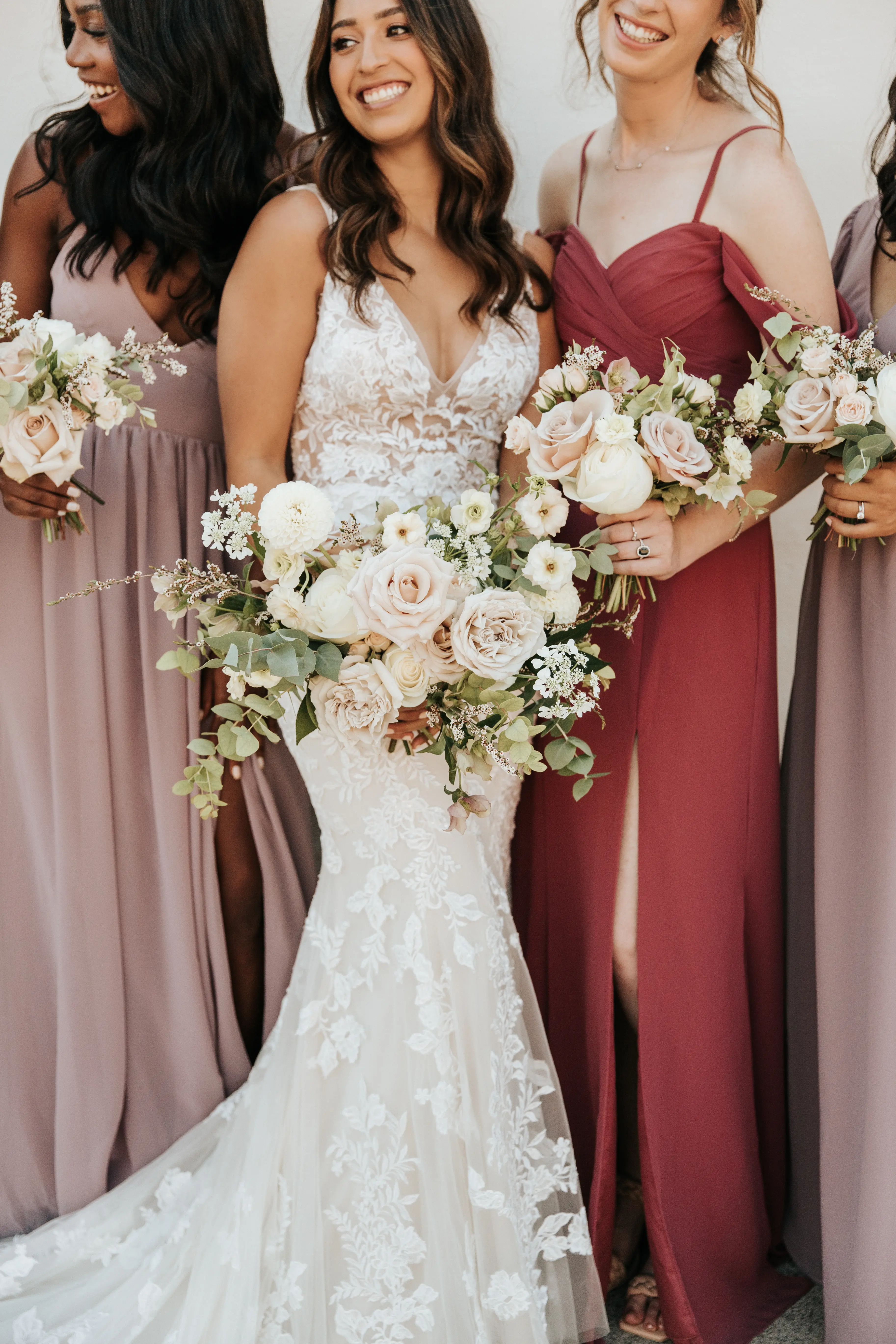 Bride with groom wearing floral fit and flare wedding dress