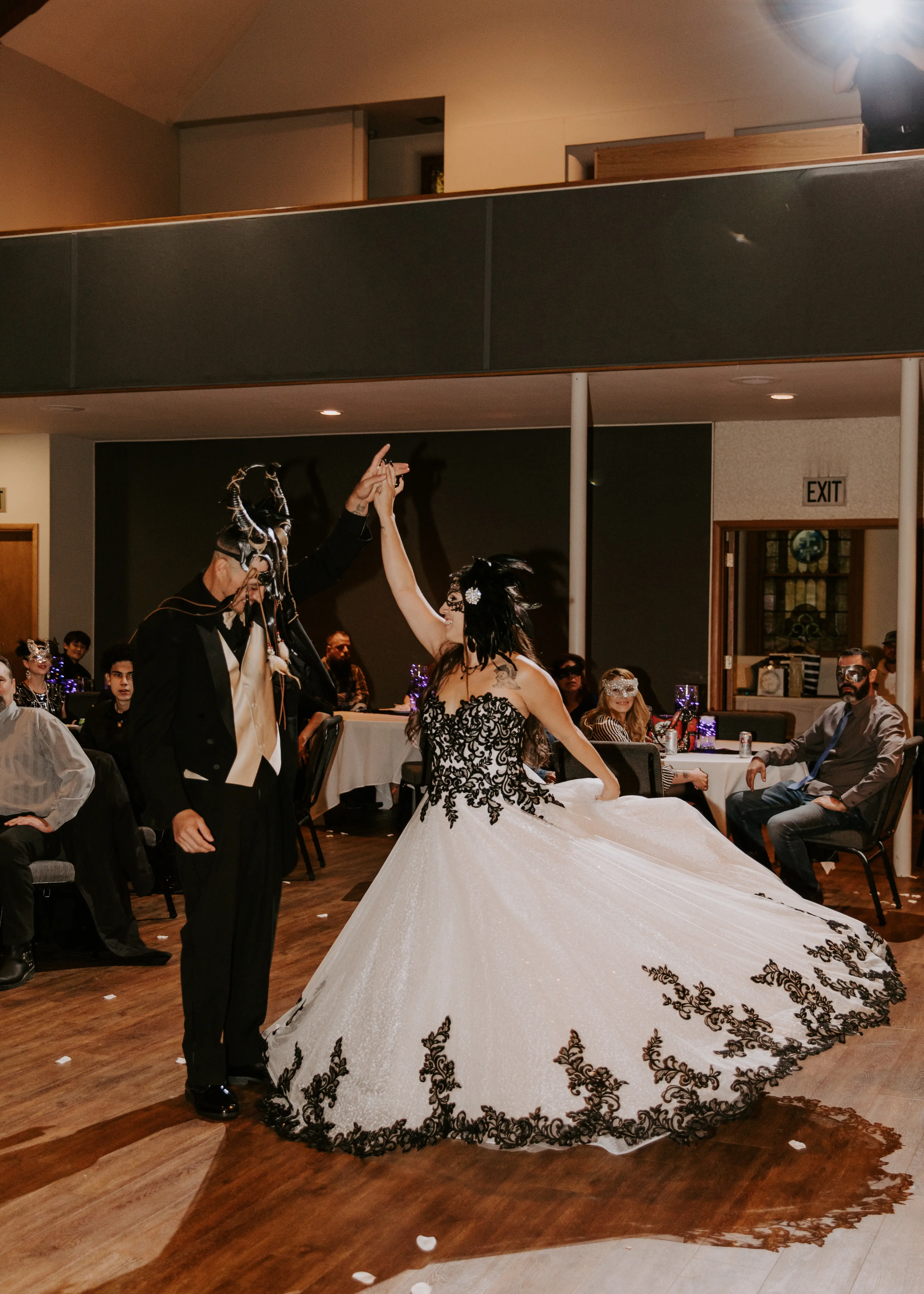 Bride wearing Black Lace Ballgown Wedding Dress called Tristyn by Maggie Sottero dancing with her groom