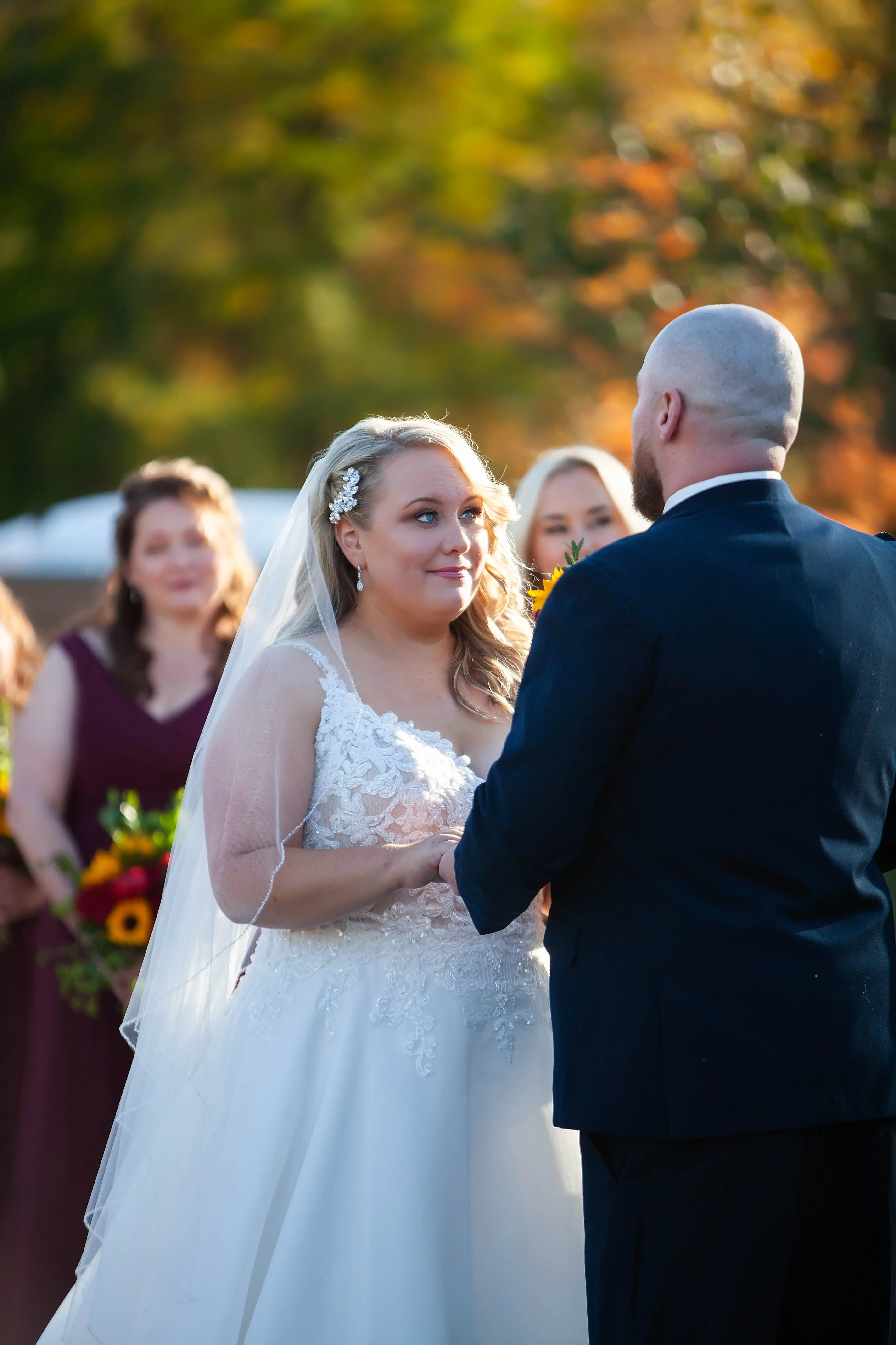 Bride Wearing Lace Ballgown Wedding Dress Called Savannah By Maggie Sottero With Groom At The Ceremony