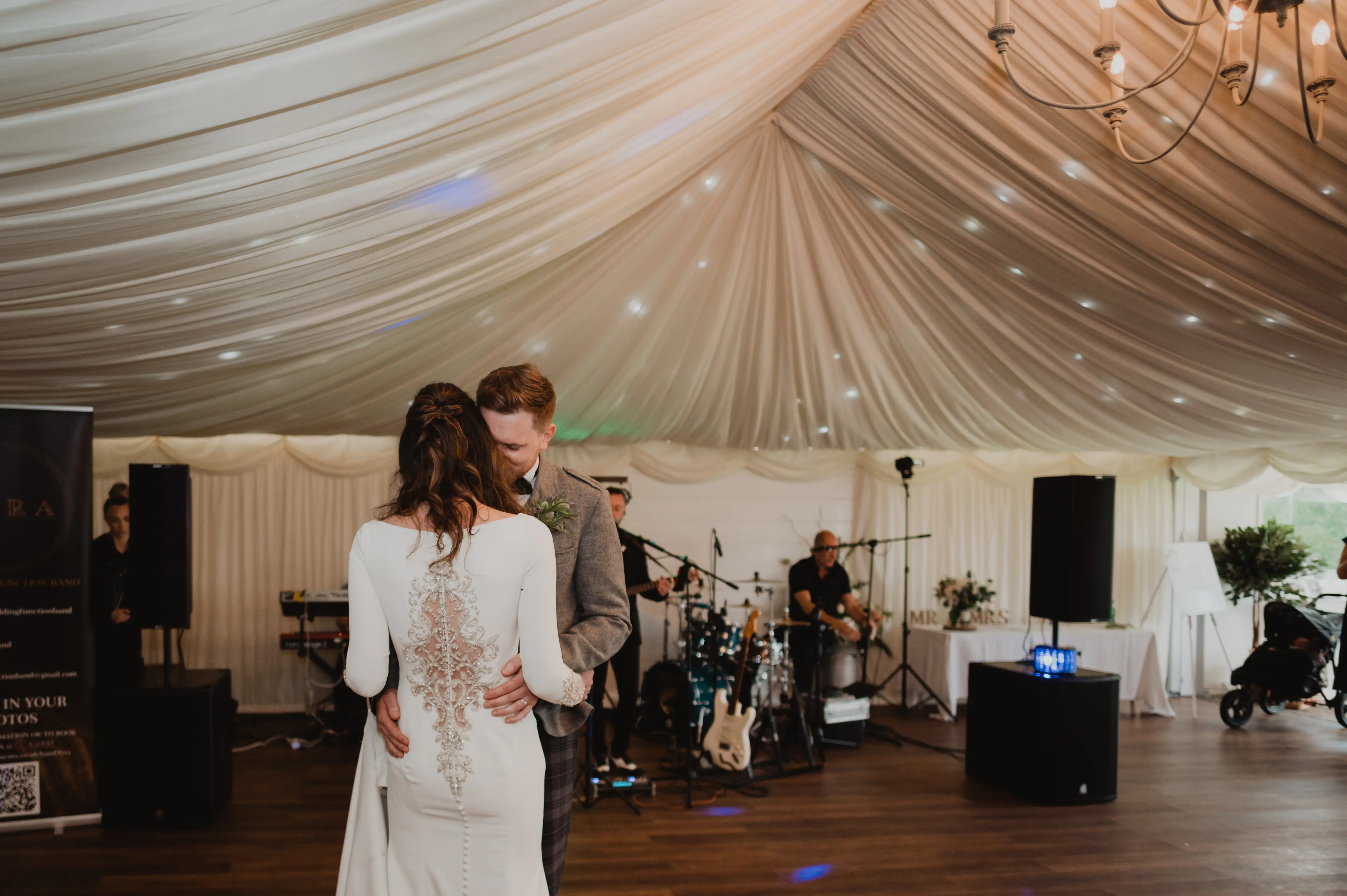 Real Bride in Crepe Fit-and-Flare Wedding Dress with a Statement Back of Beaded Illusion Embroidery Featuring Swarovski Crystals Called Aston by Sottero & Midgely
