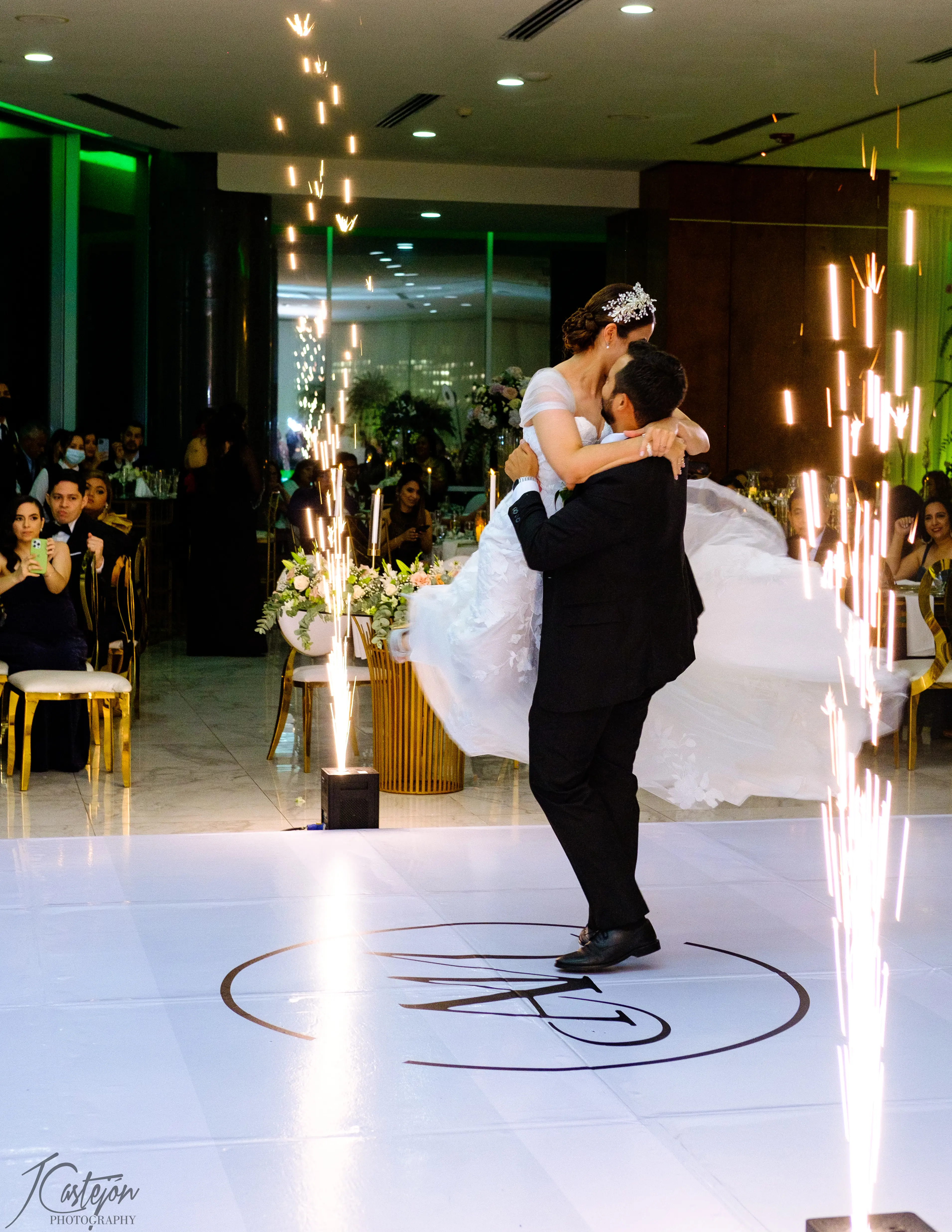 Groom Spinning Bride on Dance Floor at Reception Wearing a Wedding Dress Called Hattie by Rebecca Ingram