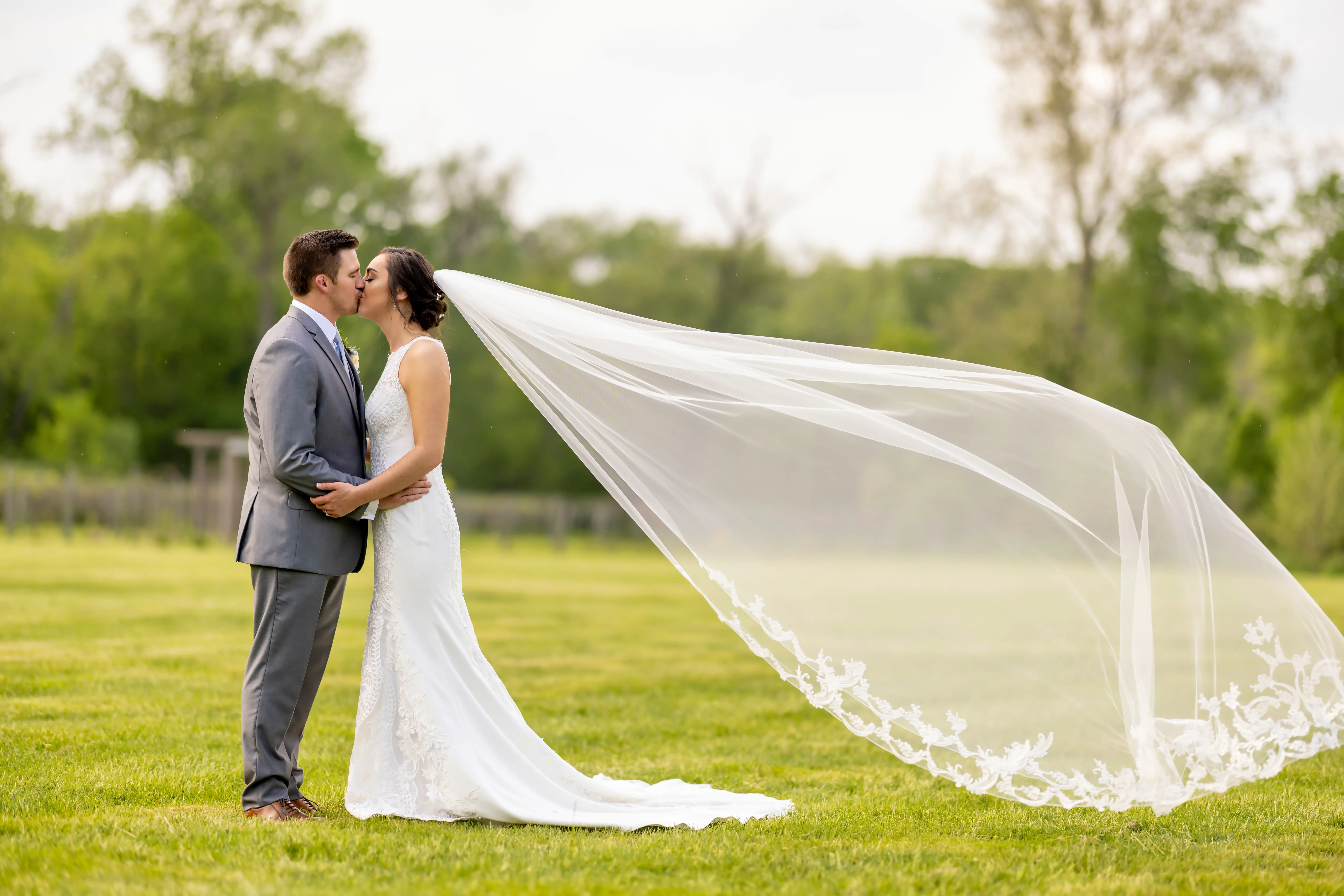 Groom With Bride Wearing Lace Halter Wedding Dress Kevyn By Sottero And Midgley