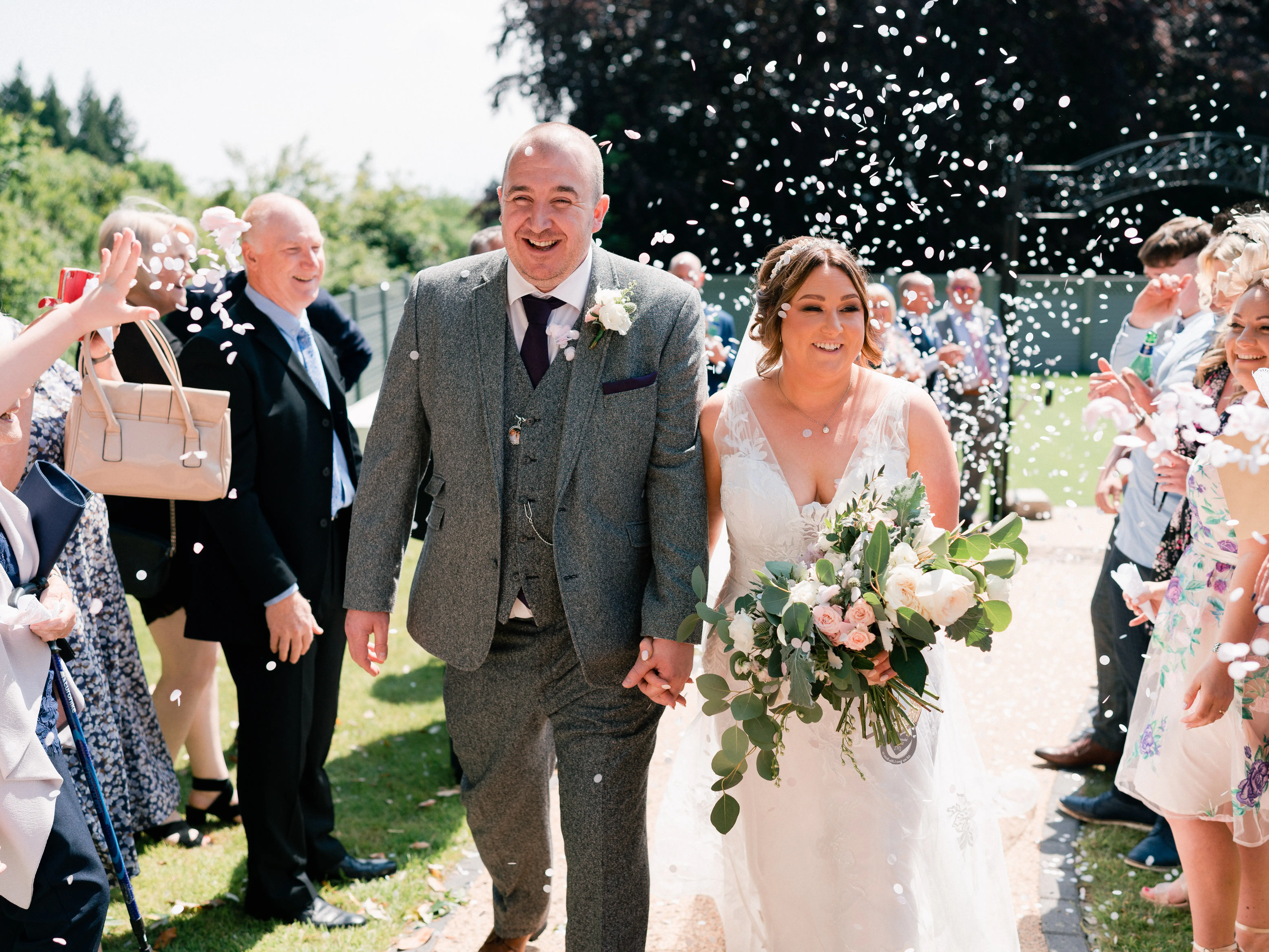 Real Bride in A-Line Wedding Gown with Lace Motifs Over Tulle and Beaded Lace Bodice Embellished with Swarovski Crystals Called Priscilla by Rebecca Ingram