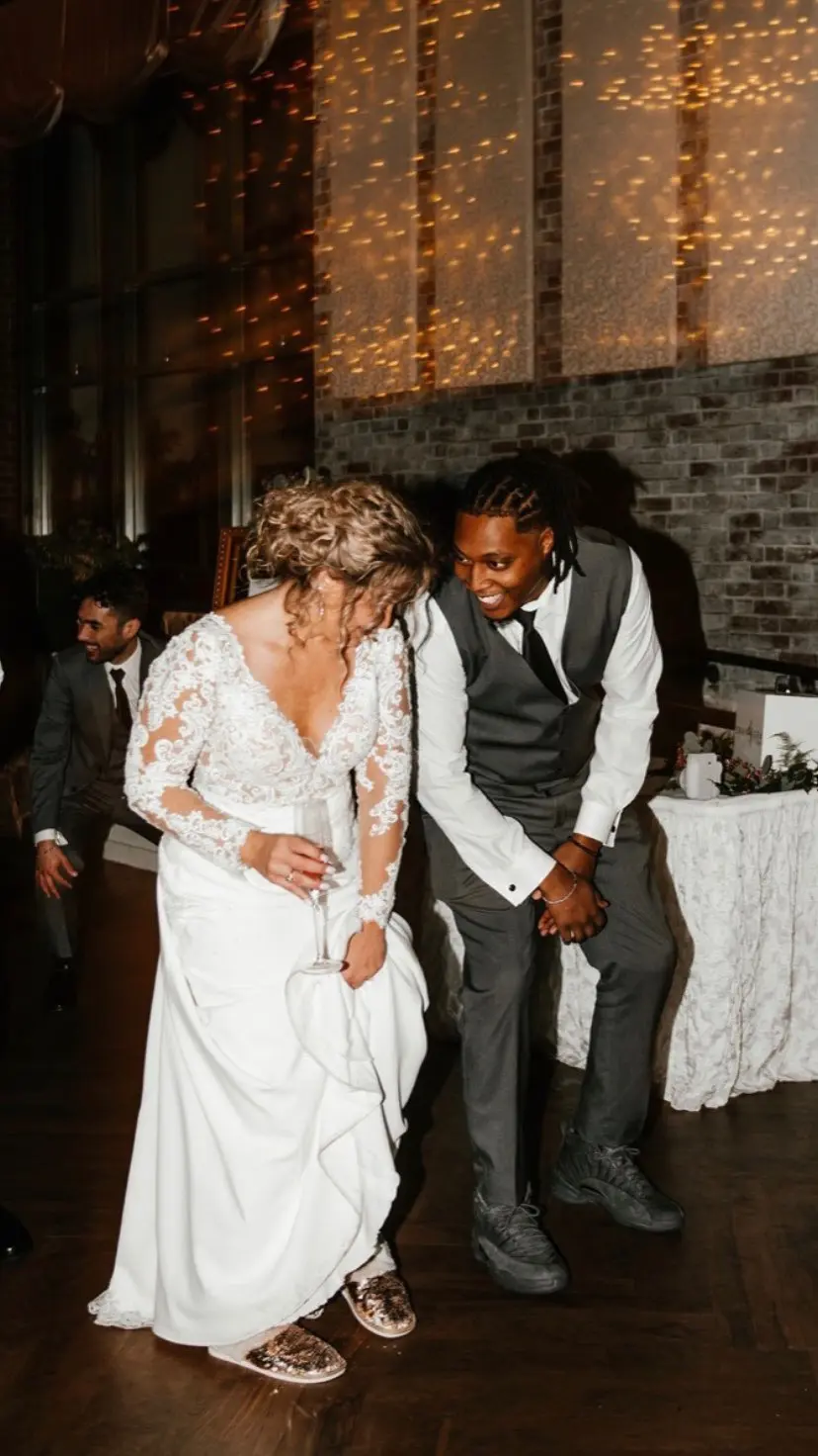 Groom With Bride Wearing Long Sleeve Sheath Wedding Dress Althea By Maggie Sottero