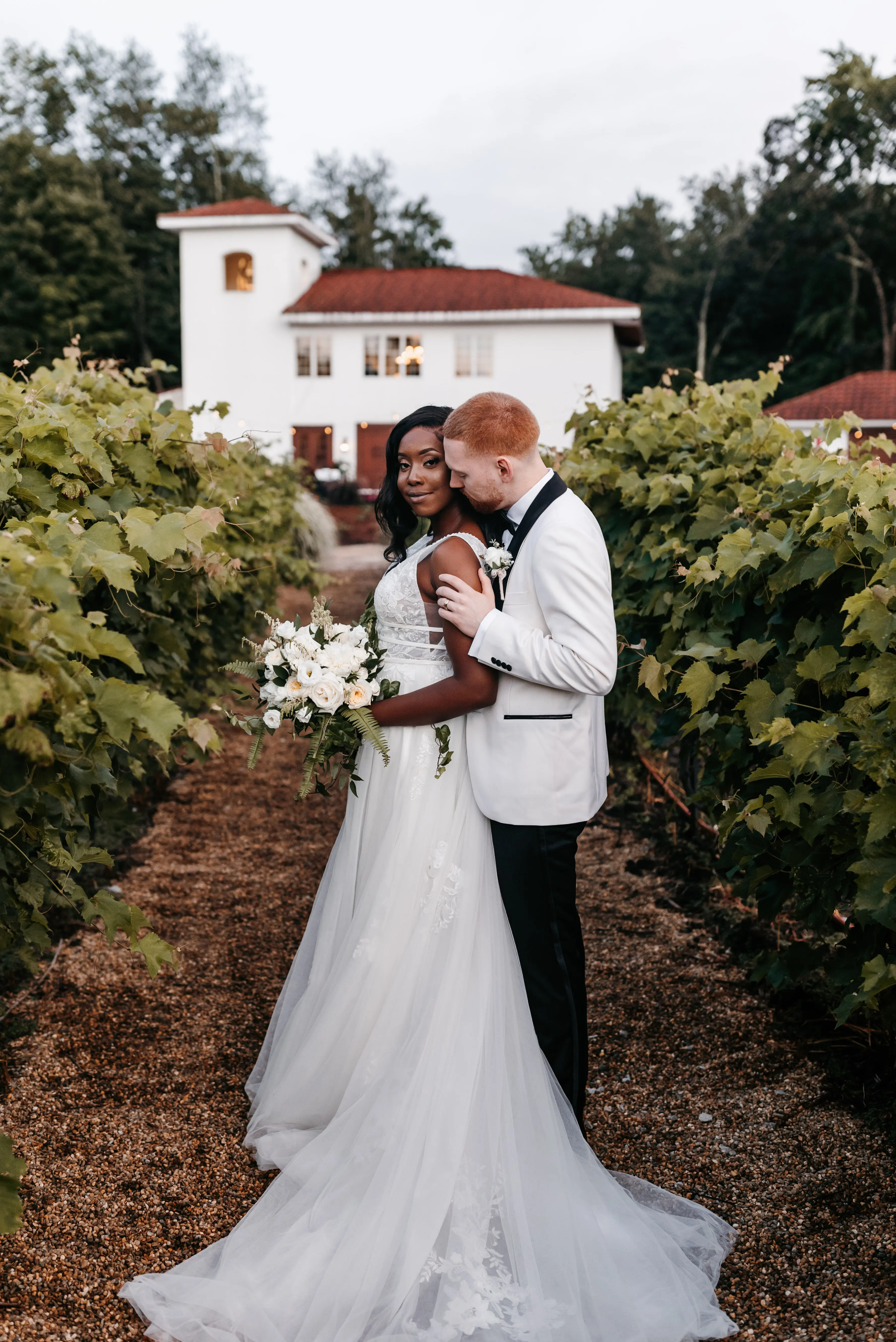 Groom With Bride Wearing Lace A-line Raelynn By Rebecca Ingram