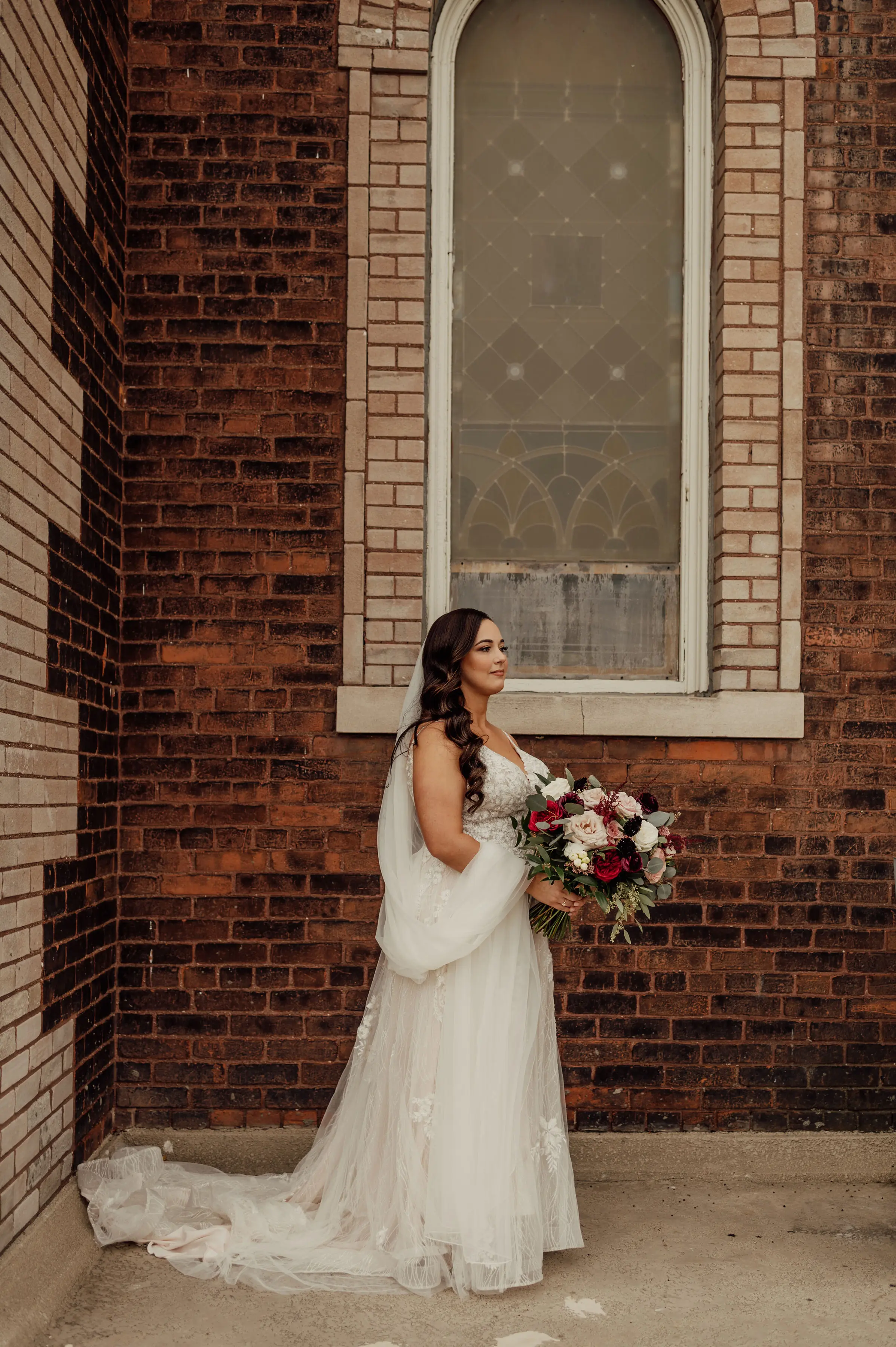 Bride Wearing Floral Lace Wedding Gown Called Laramie By Sottero And Midgley
