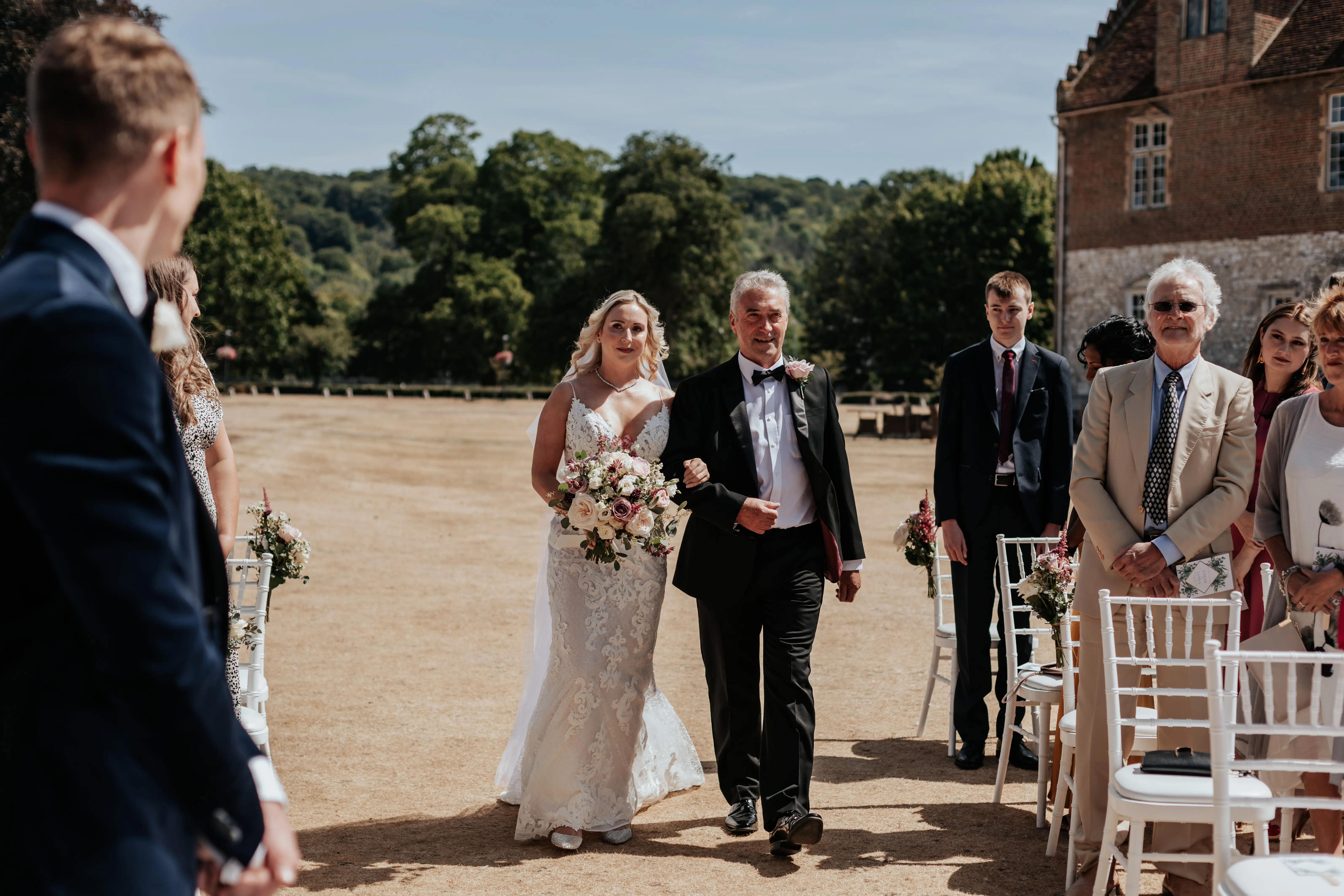 Real Bride in Lace Sheath Wedding Gown with Illusion Plunging Sweetheart Neckline Called Tuscany Lynette by Maggie Sottero