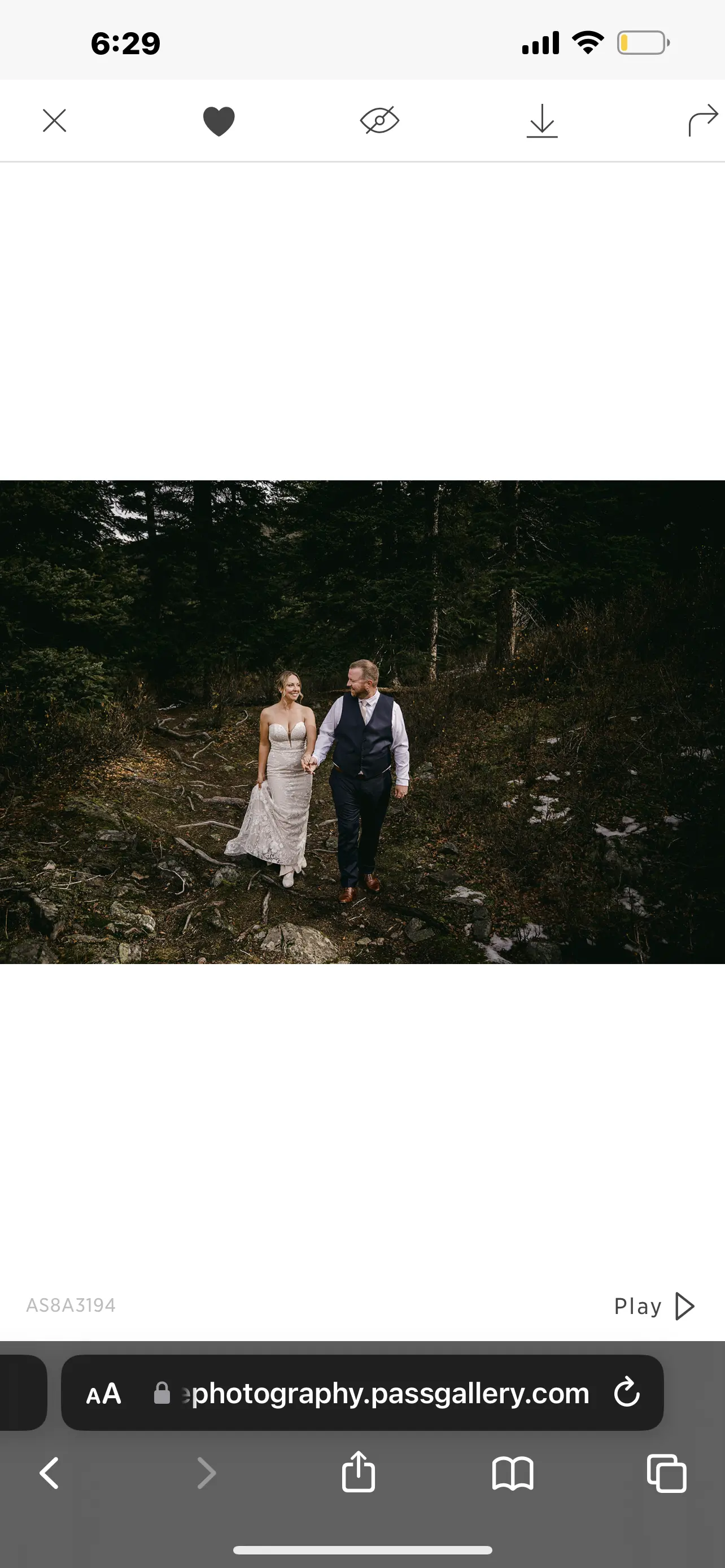 Bride wearing Nelly wedding dress by Rebecca Ingram with her husband