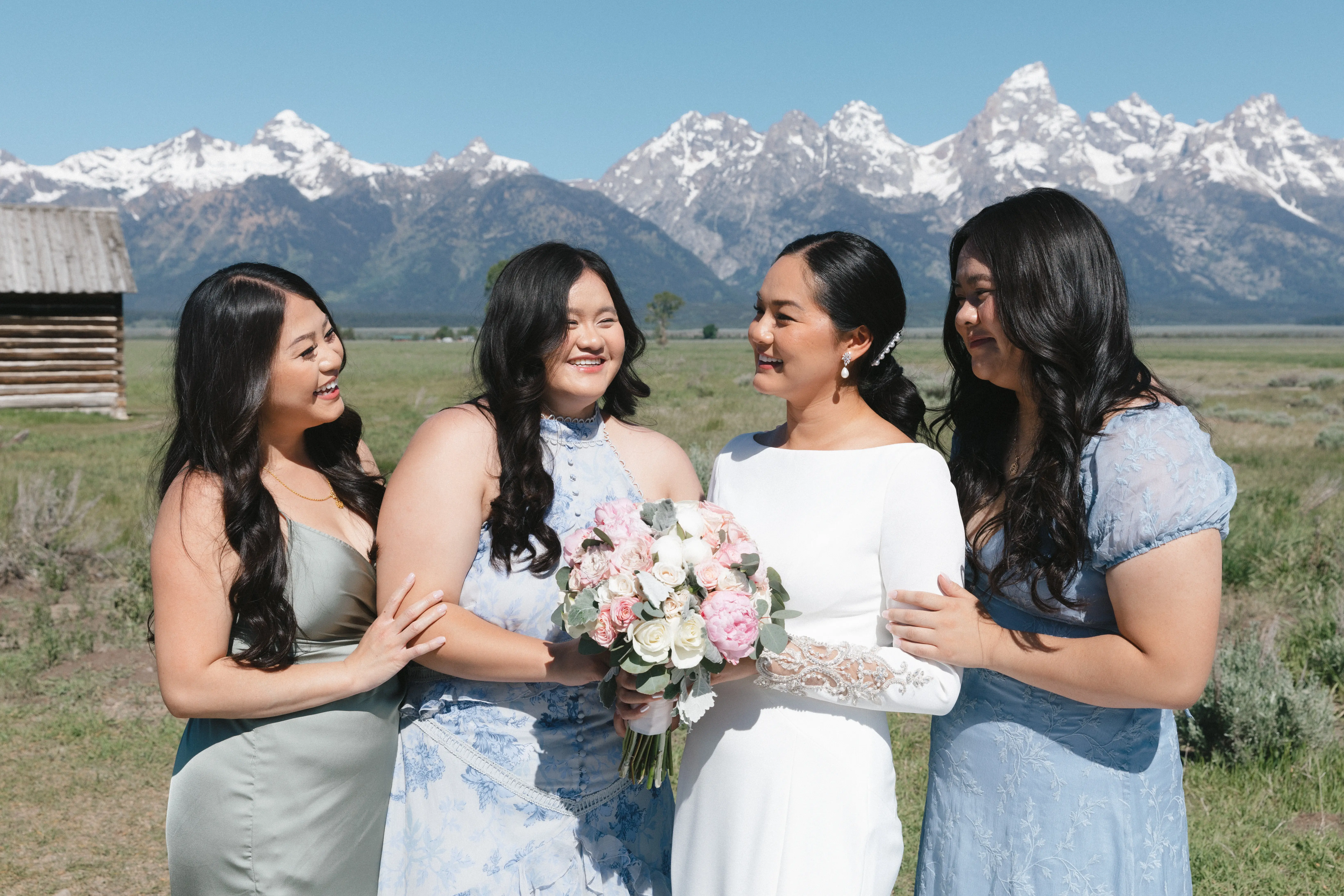 Bride wearing Aston by Sottero and Midgley with her bridesmaids
