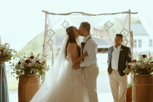 Groom With Bride Wearing Floral Lace Wedding Dress Lettie By Rebecca Ingram
