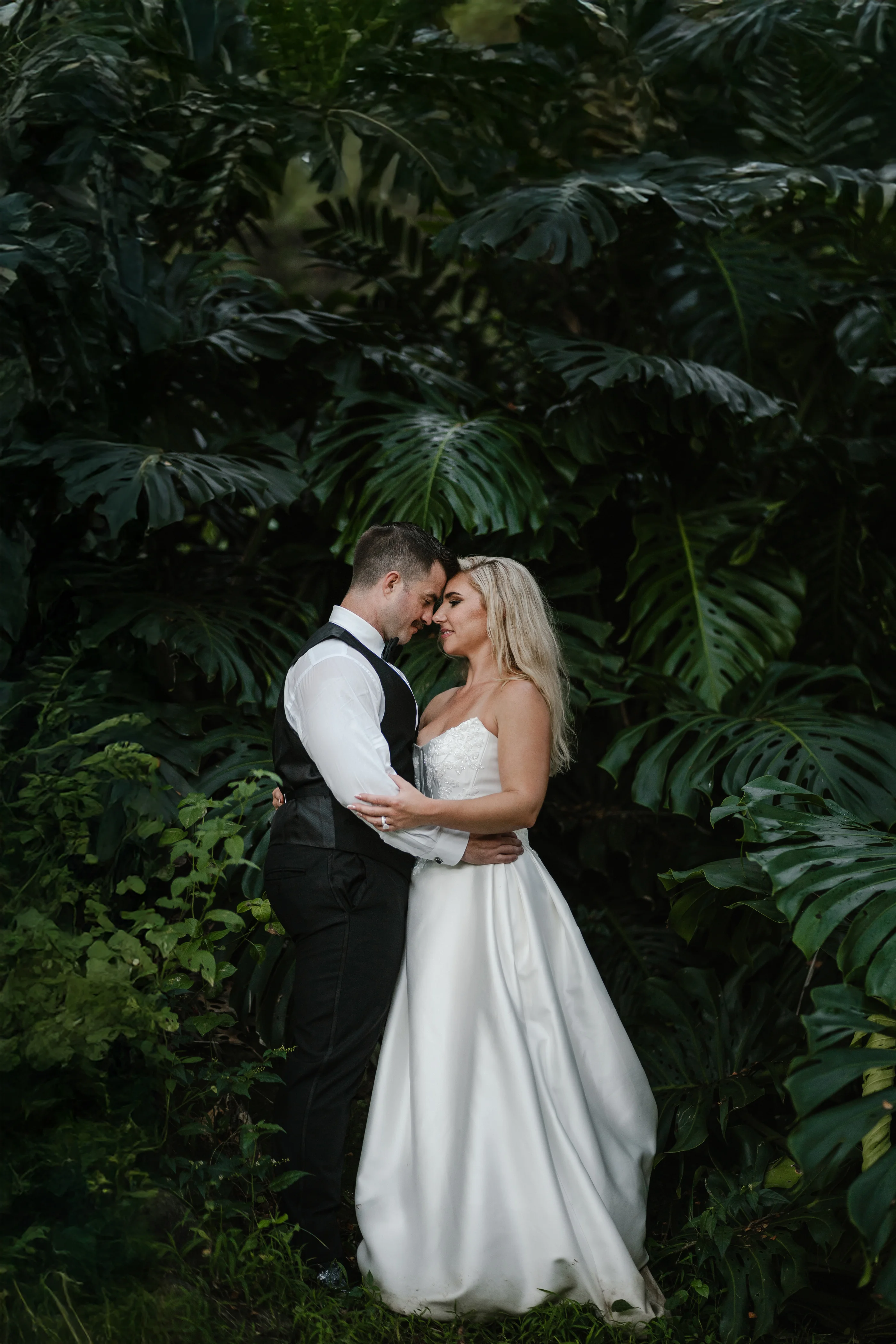 Bride Wearing Sexy Slit Satin Wedding Dress Called Amadora By Sottero And Midgley With Groom