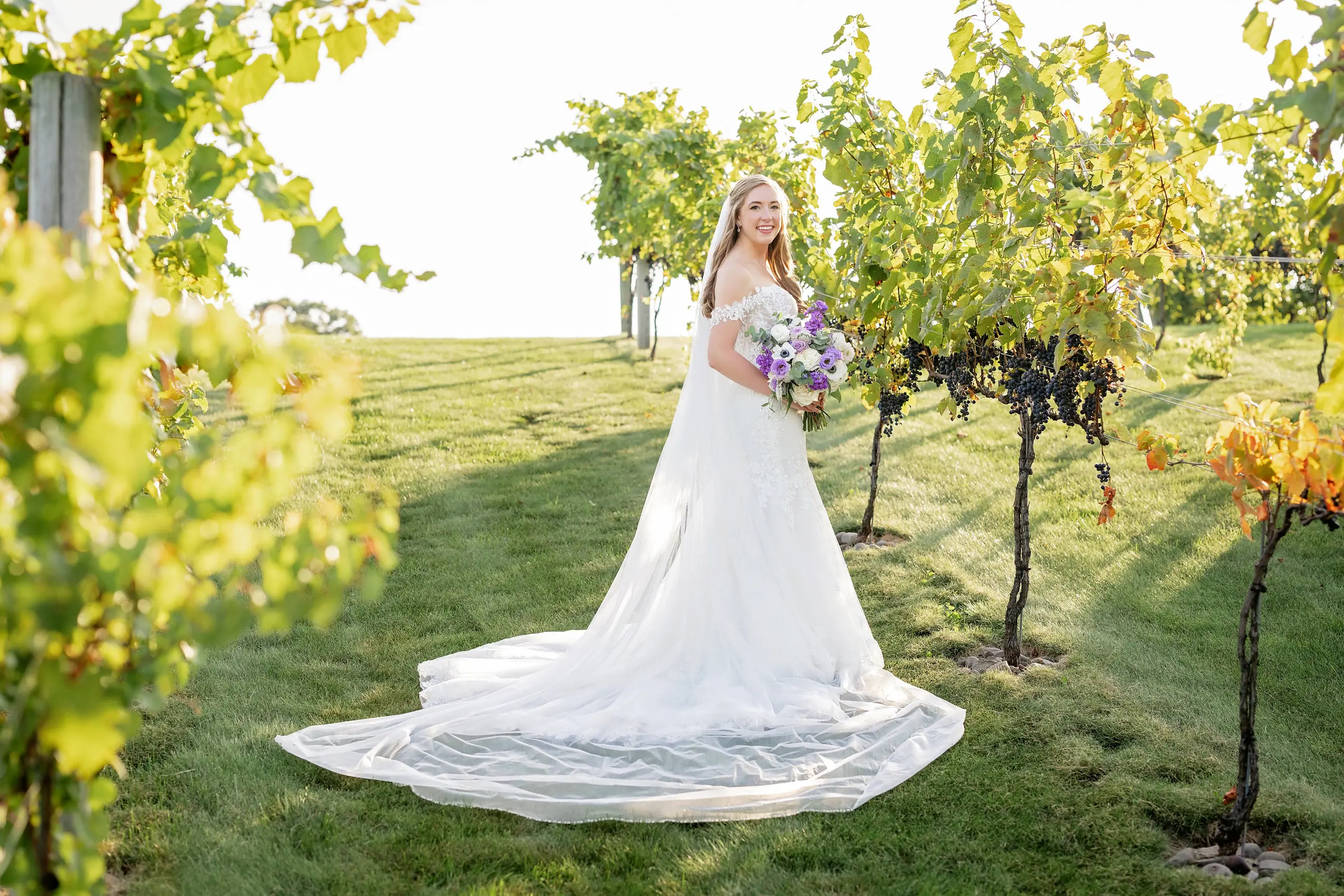 Bride Wearing Lace Wedding Dress Called Lennon By Maggie Sottero In A Vineyard