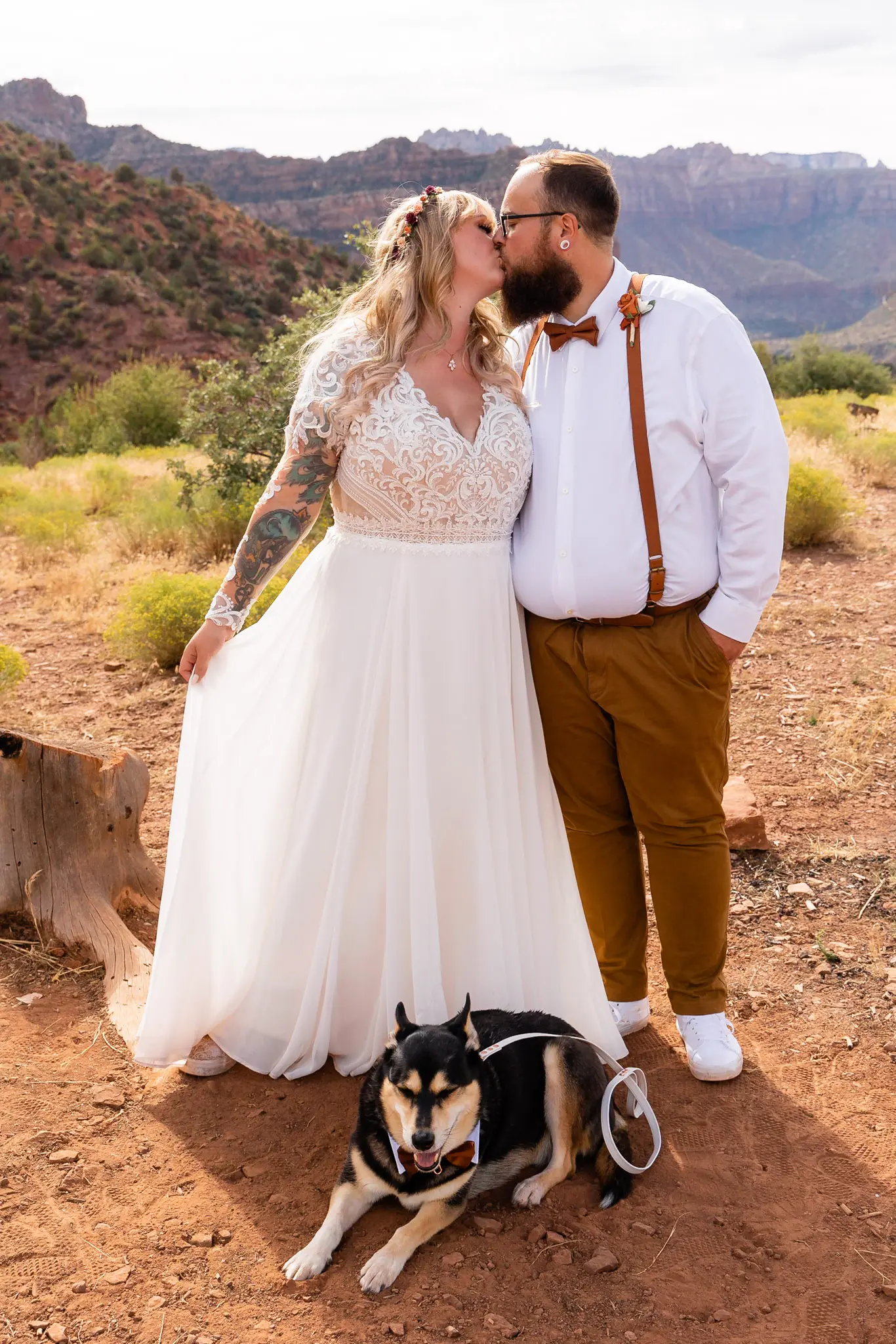 Real Bride in Long Sleeved, Thigh-High Slit Wedding Dress Named Lorraine by Rebecca Ingram with Groom and Dog