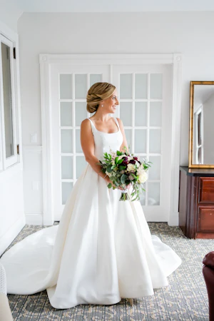 Bride wearing Simple Ballgown Wedding Dress called Selena by Maggie Sottero