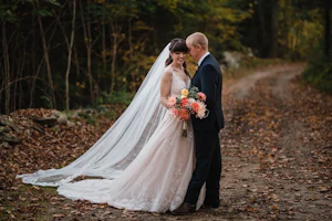 Bride Wearing Lace A-Line Wedding Dress Called Wallis By Maggie Sottero With Groom In The Forest
