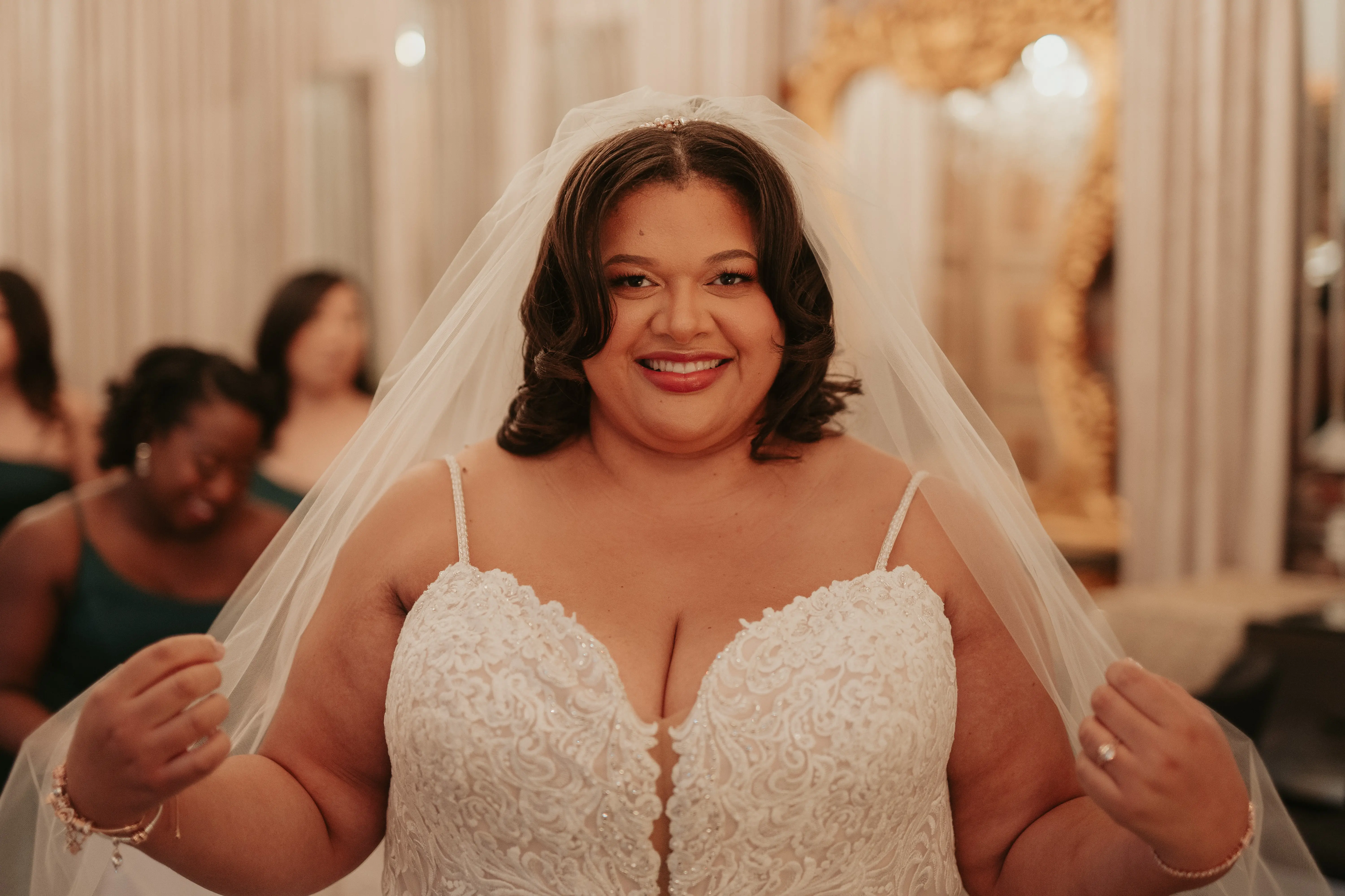 Bride Wearing Veil and Wedding Dress Called Alistaire Lynette by Maggie Sottero