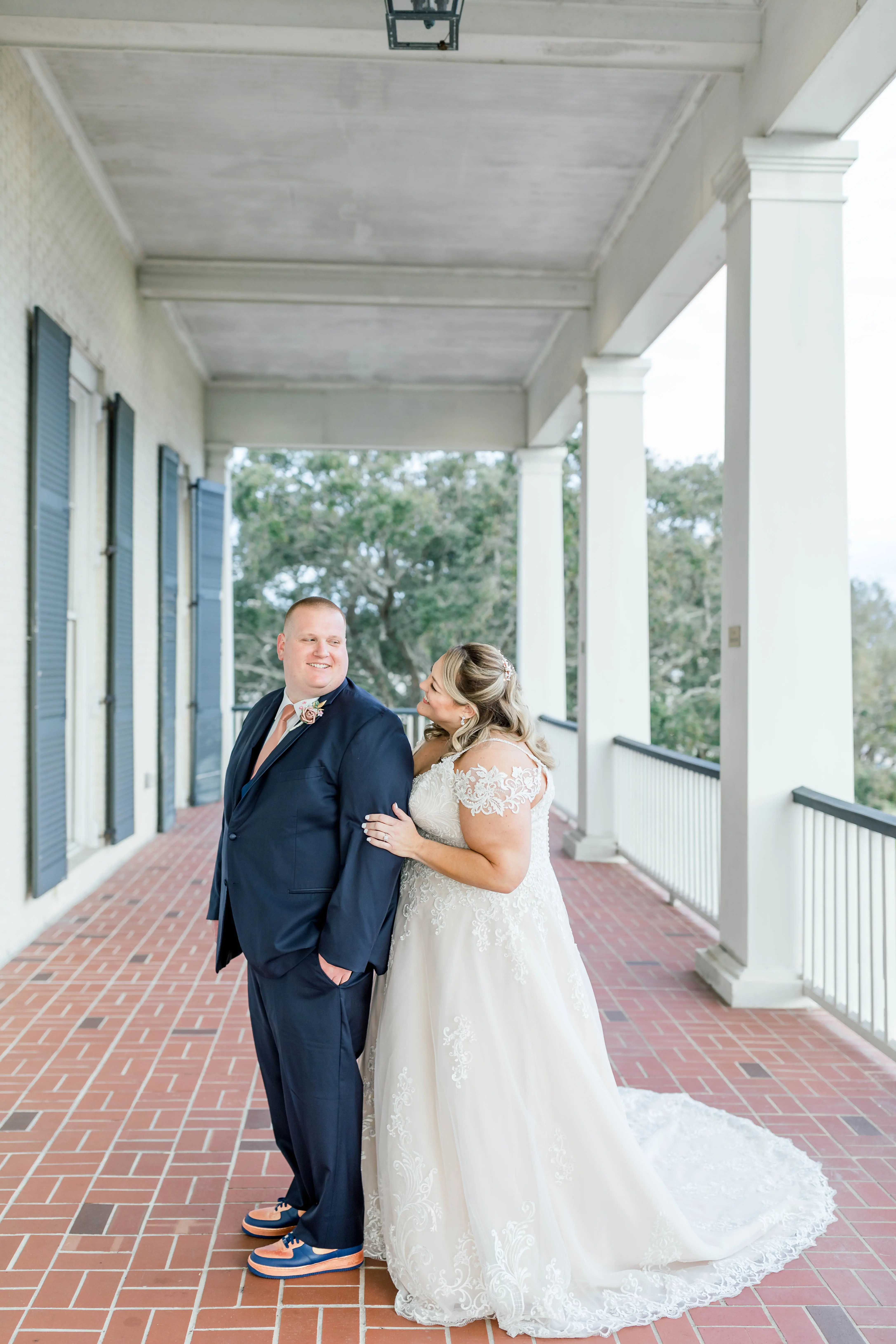 Groom with Bride Wearing A-Line Wedding Dress Called Wallis by Maggie Sottero