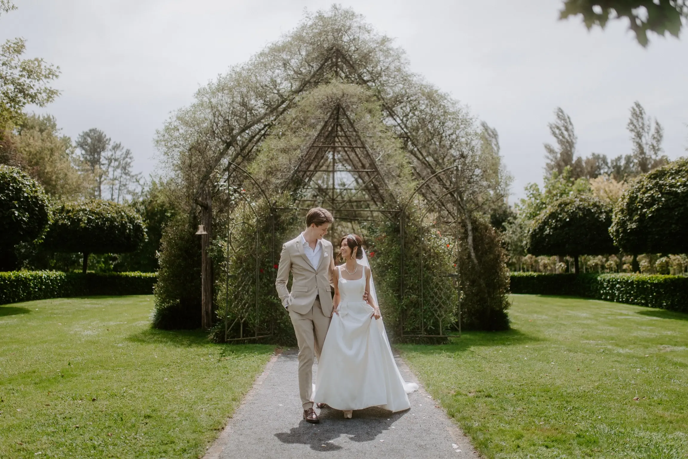 Bride In Satin A-Line Wedding Dress Called Selena By Maggie Sottero With Groom